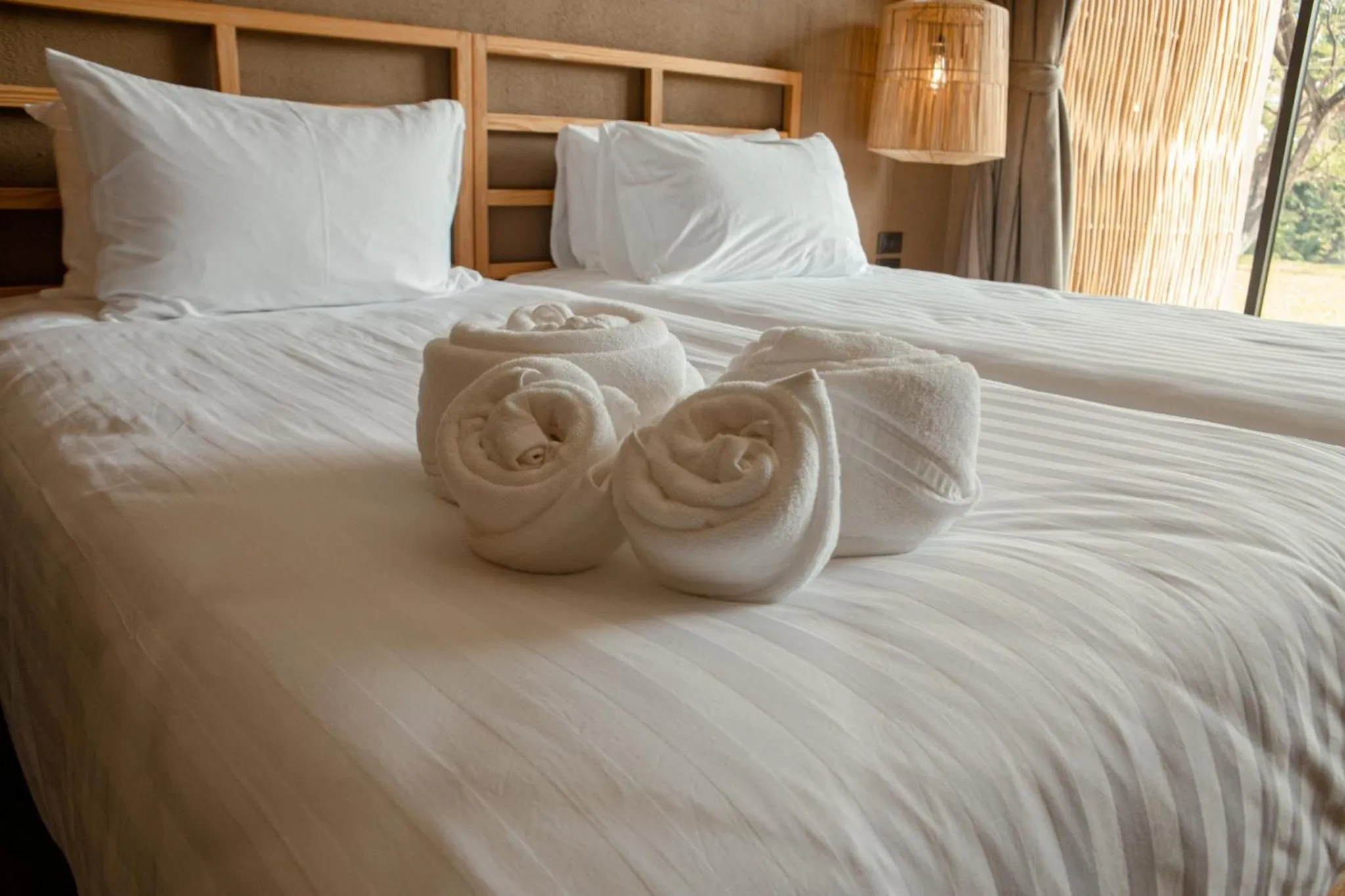 Bed in Historykan Kanchanaburi Hotel