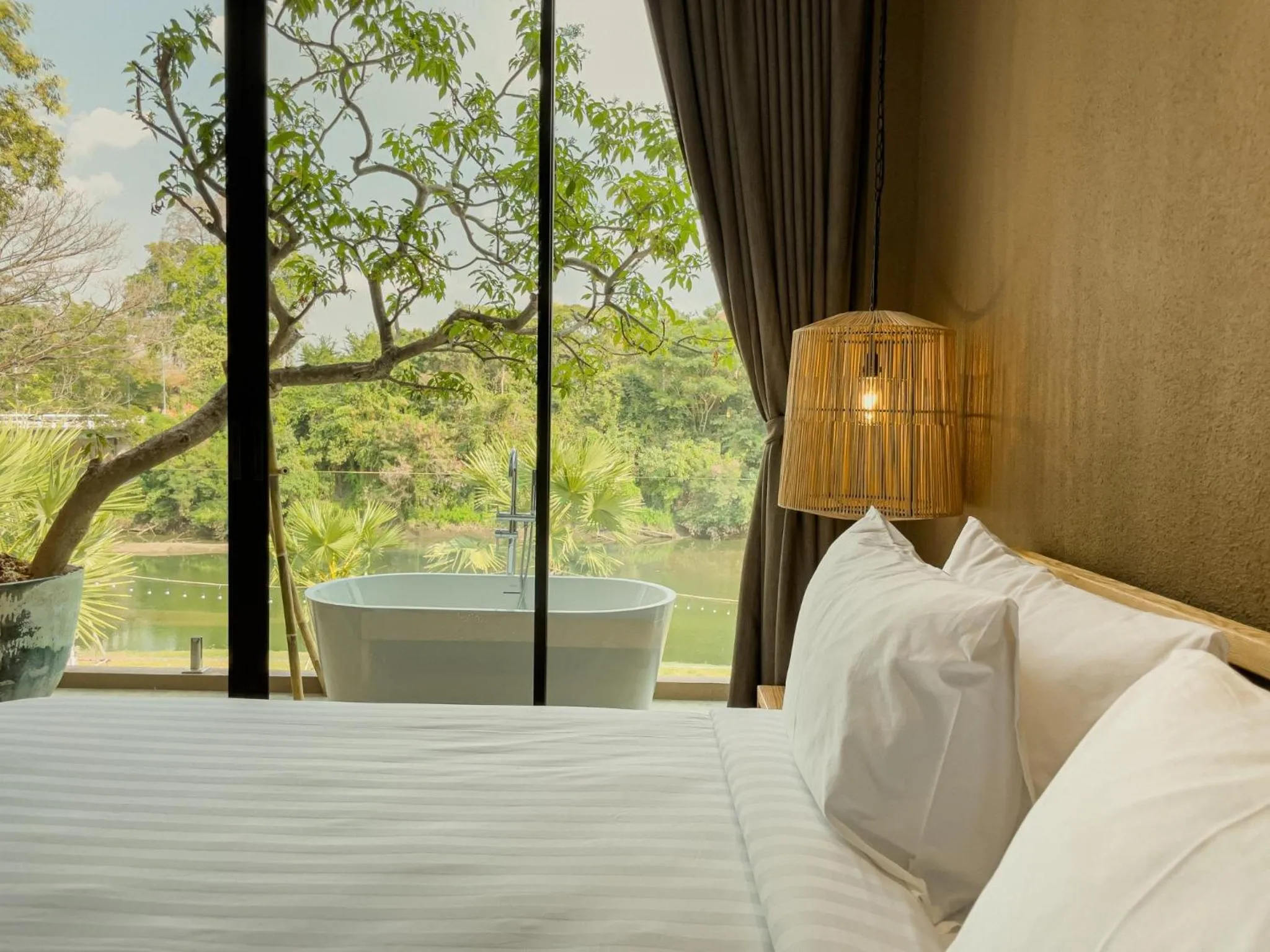 Bed in Historykan Kanchanaburi Hotel