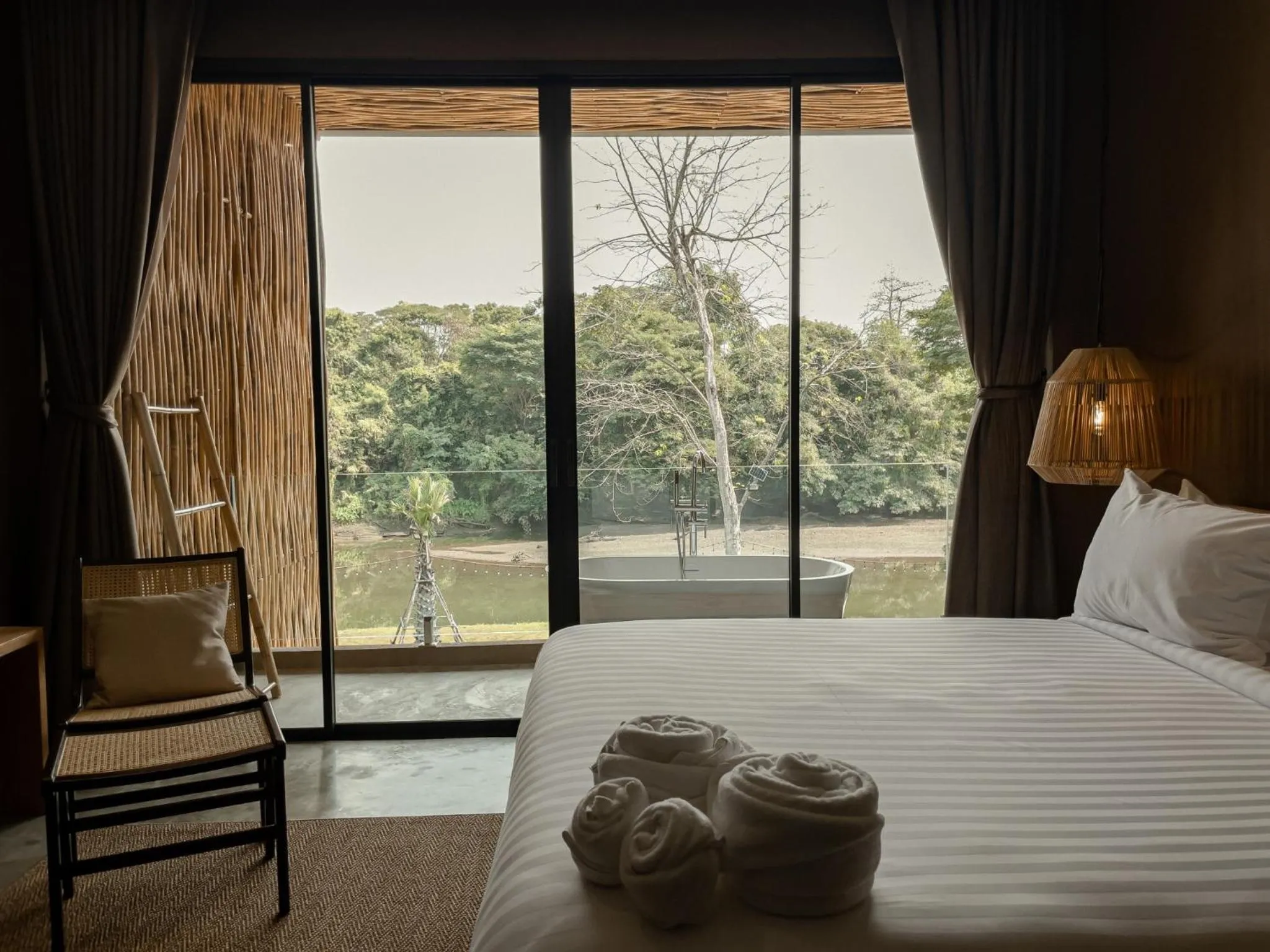 Bed in Historykan Kanchanaburi Hotel