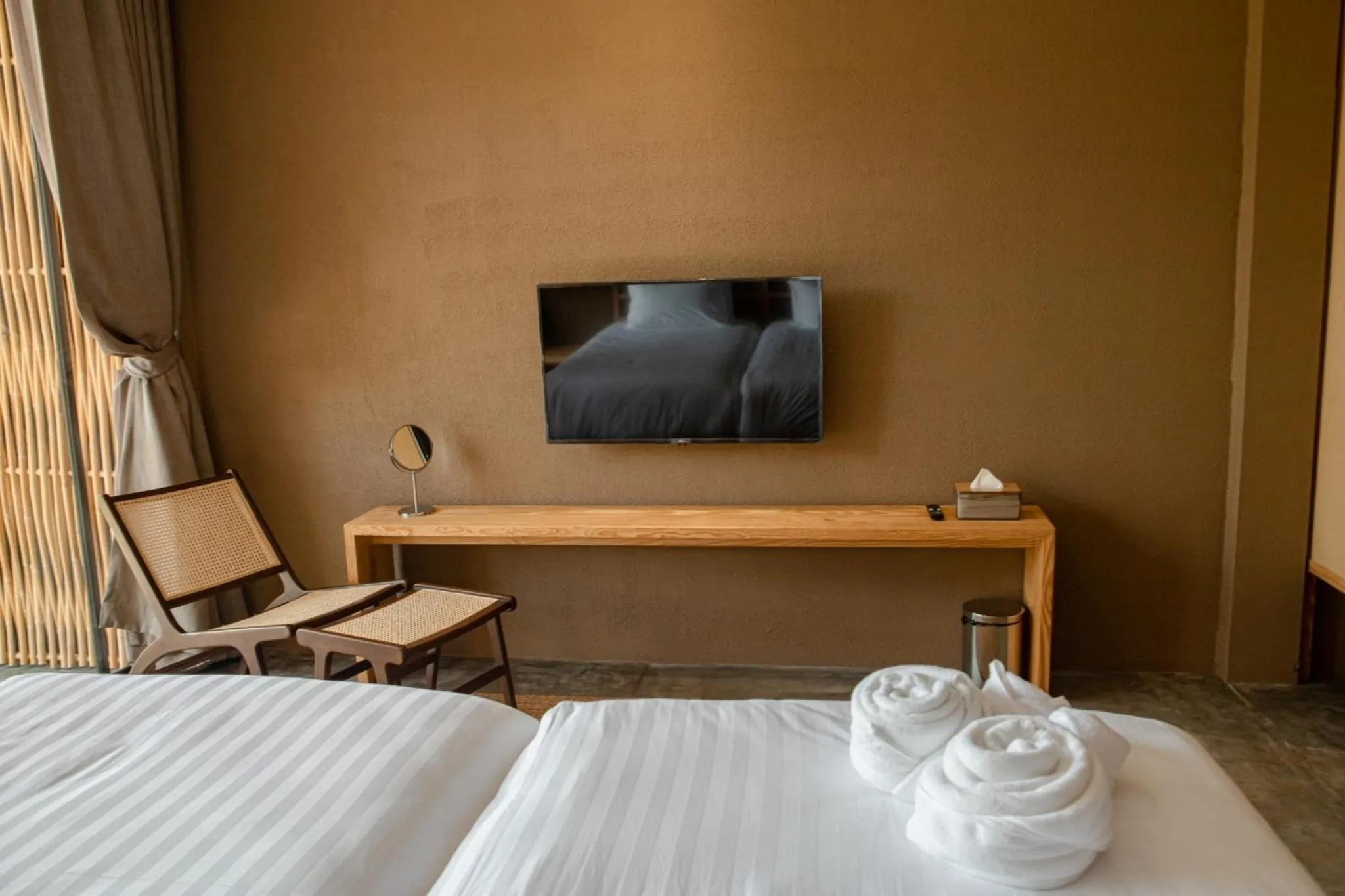 Bed in Historykan Kanchanaburi Hotel