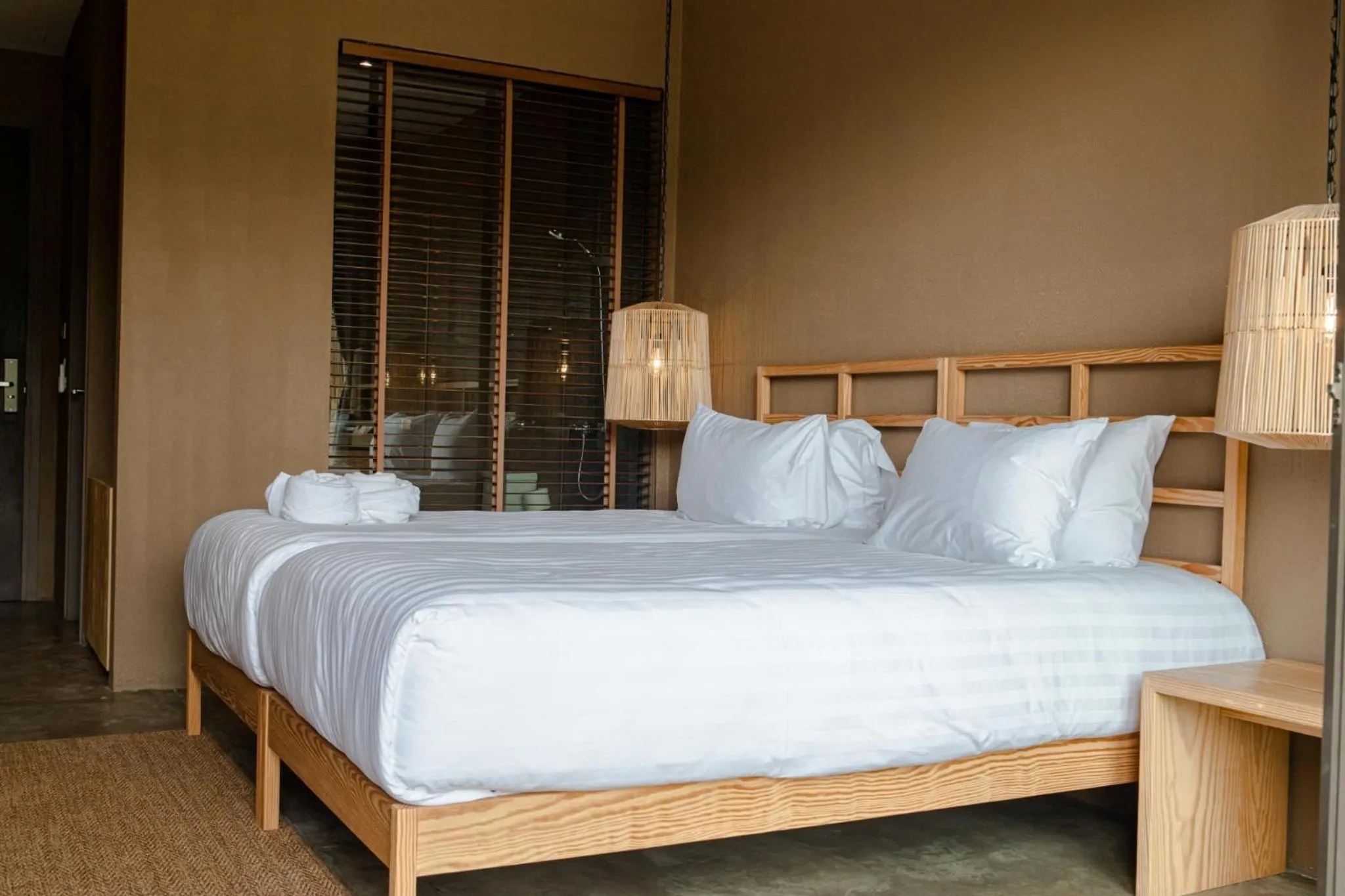 Bed in Historykan Kanchanaburi Hotel