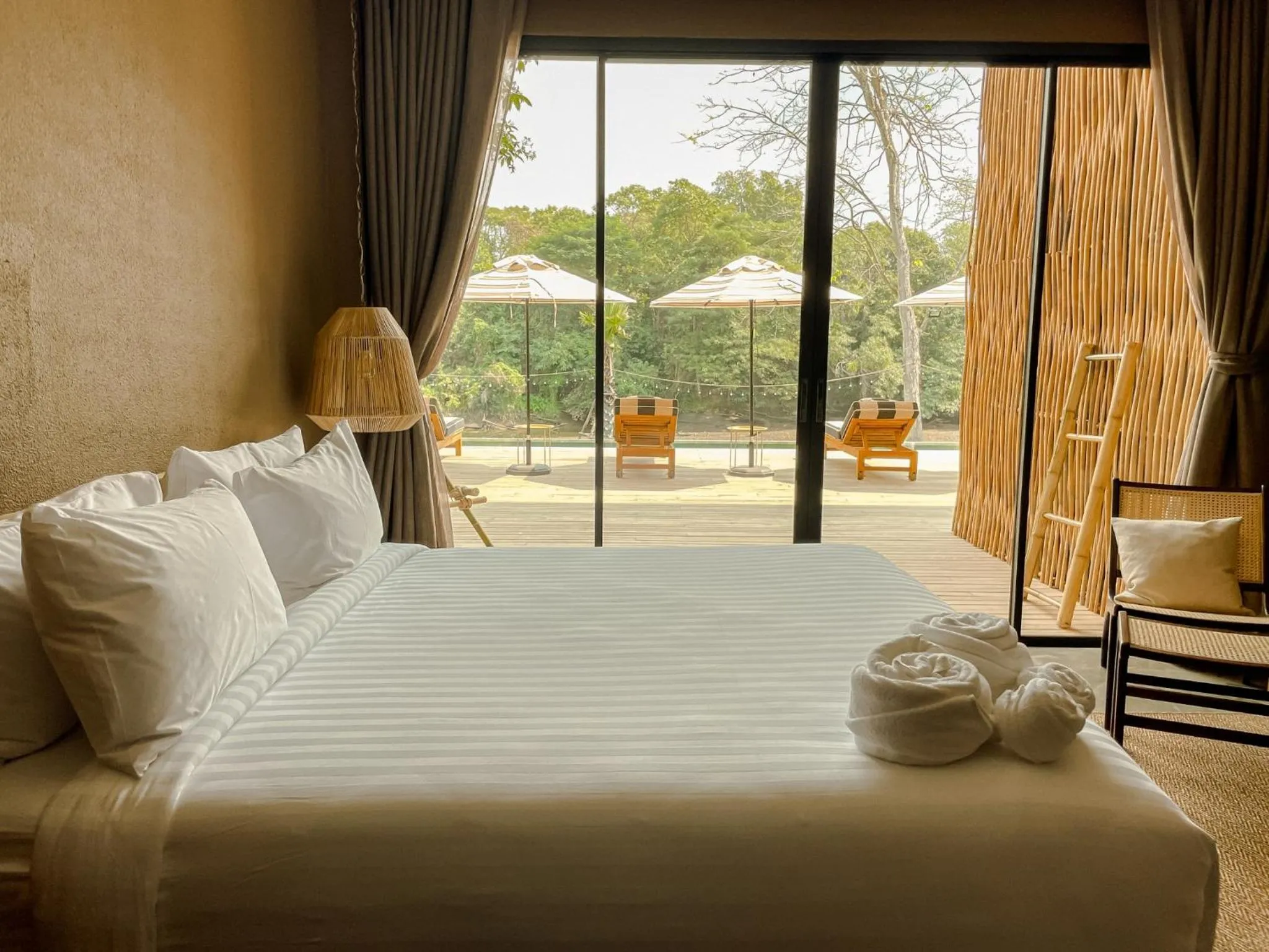 Bed in Historykan Kanchanaburi Hotel