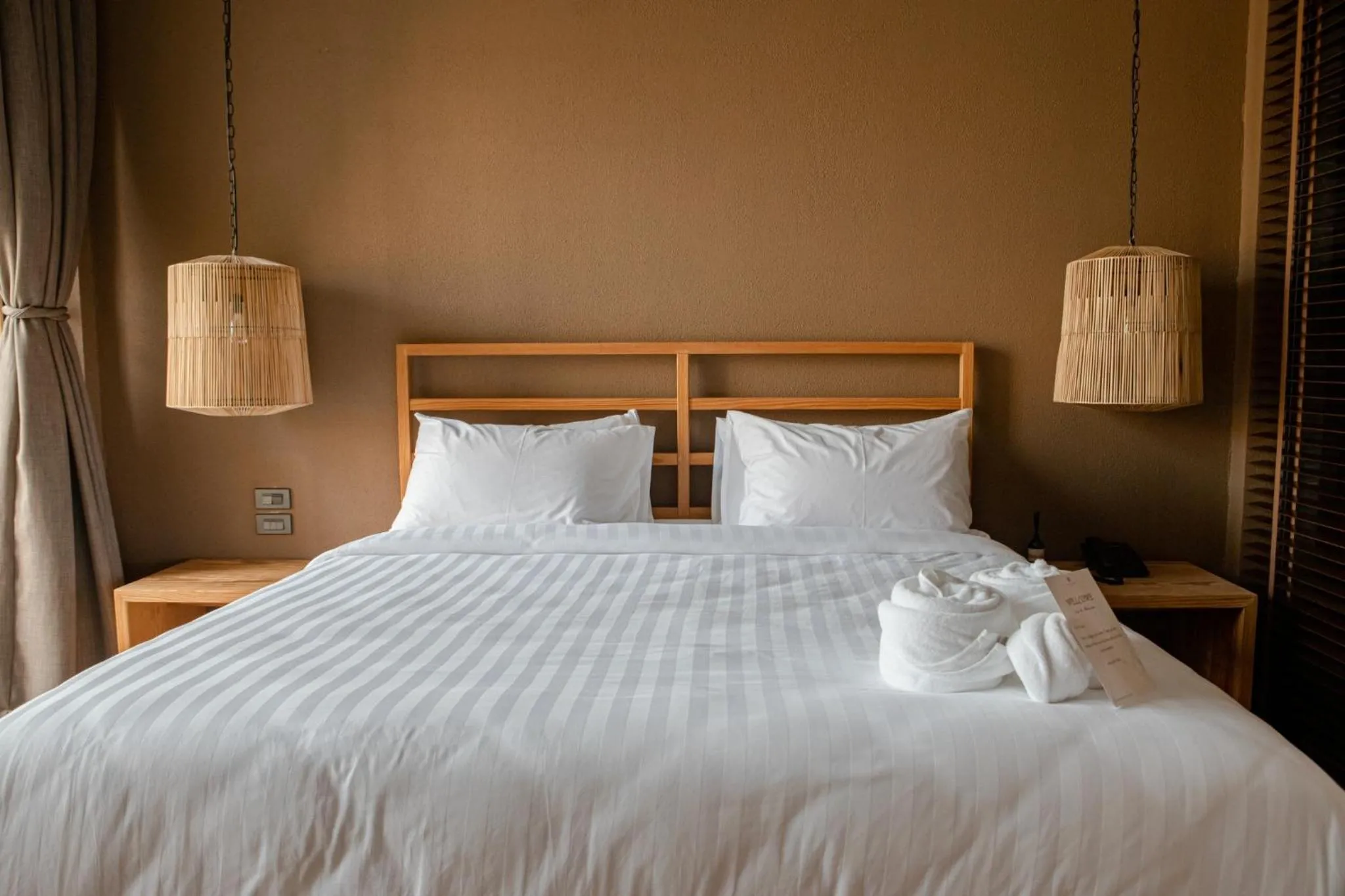 Bed in Historykan Kanchanaburi Hotel