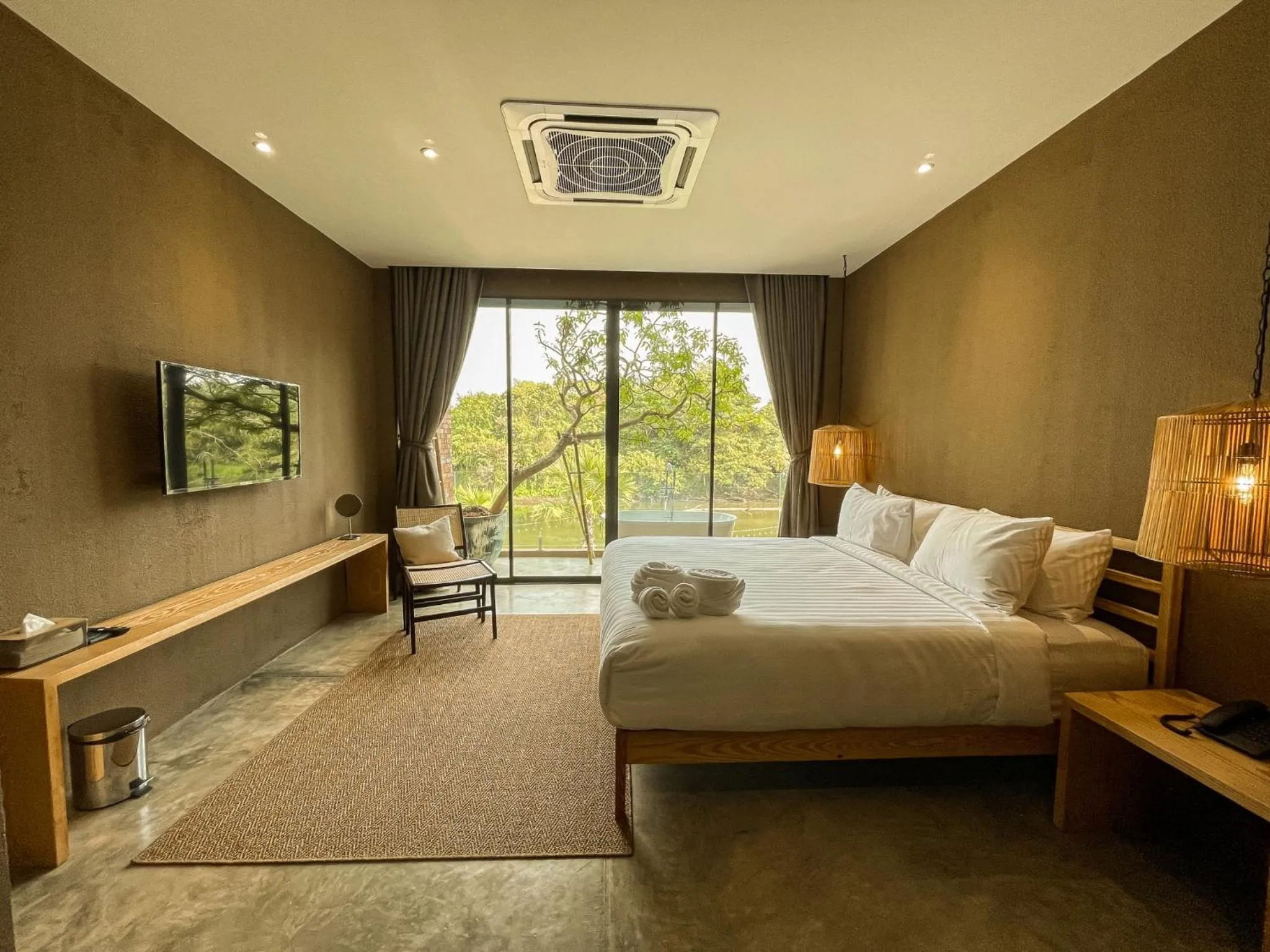 Bed in Historykan Kanchanaburi Hotel