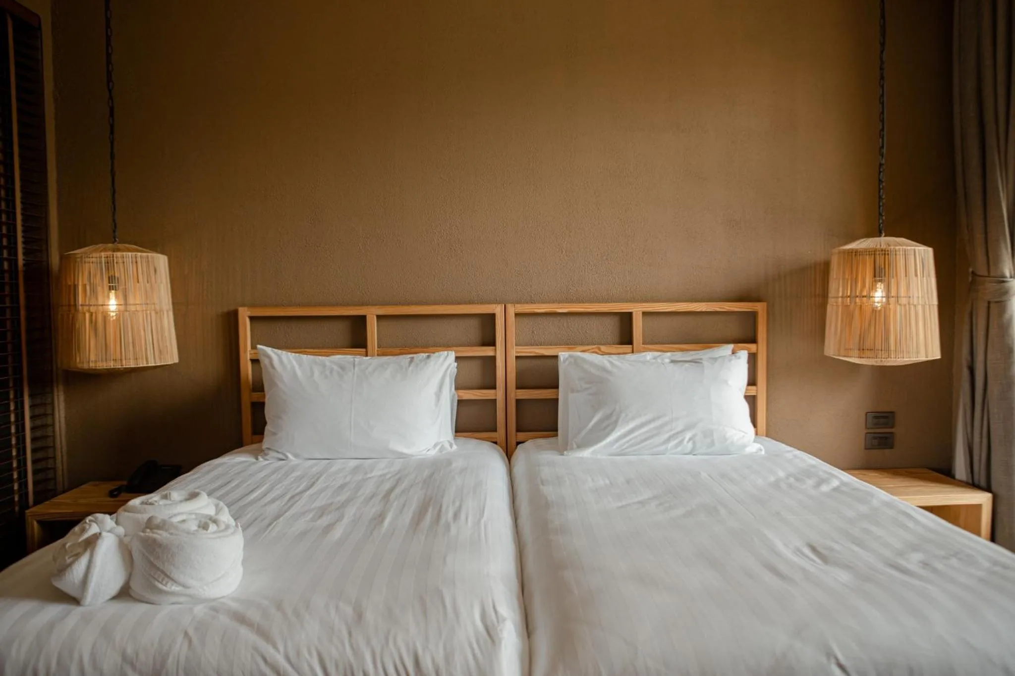 Bed in Historykan Kanchanaburi Hotel