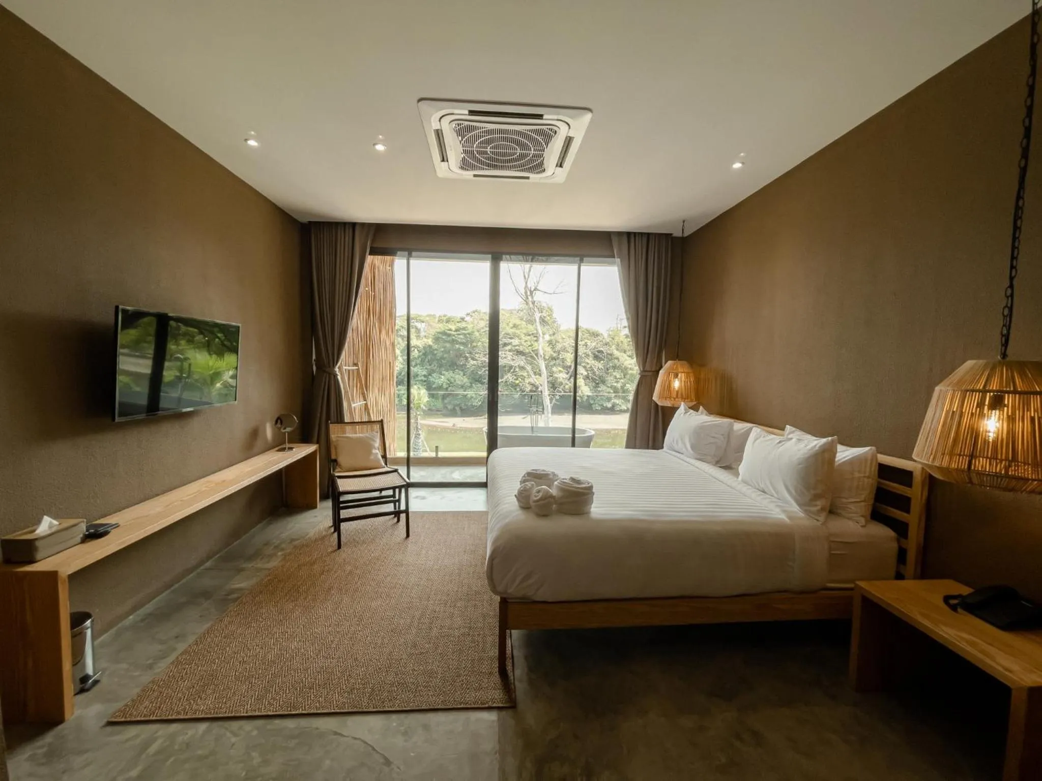 Bed in Historykan Kanchanaburi Hotel