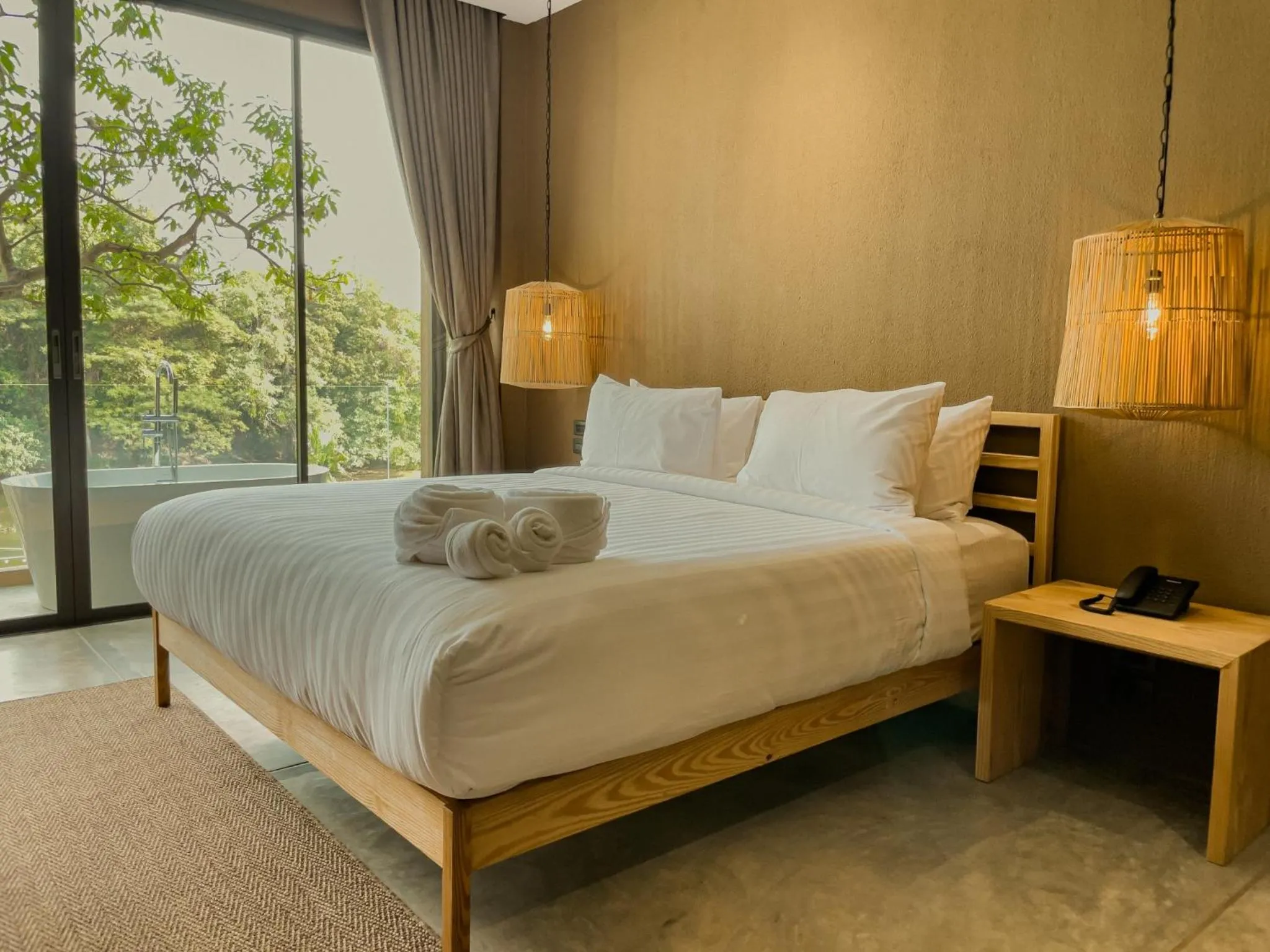 Bed in Historykan Kanchanaburi Hotel