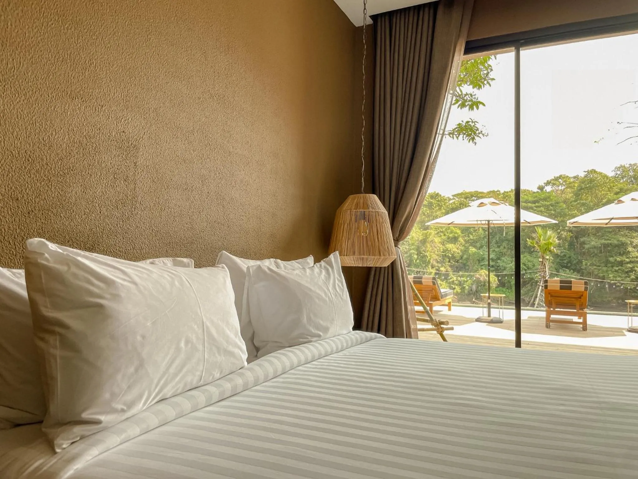 Bed in Historykan Kanchanaburi Hotel