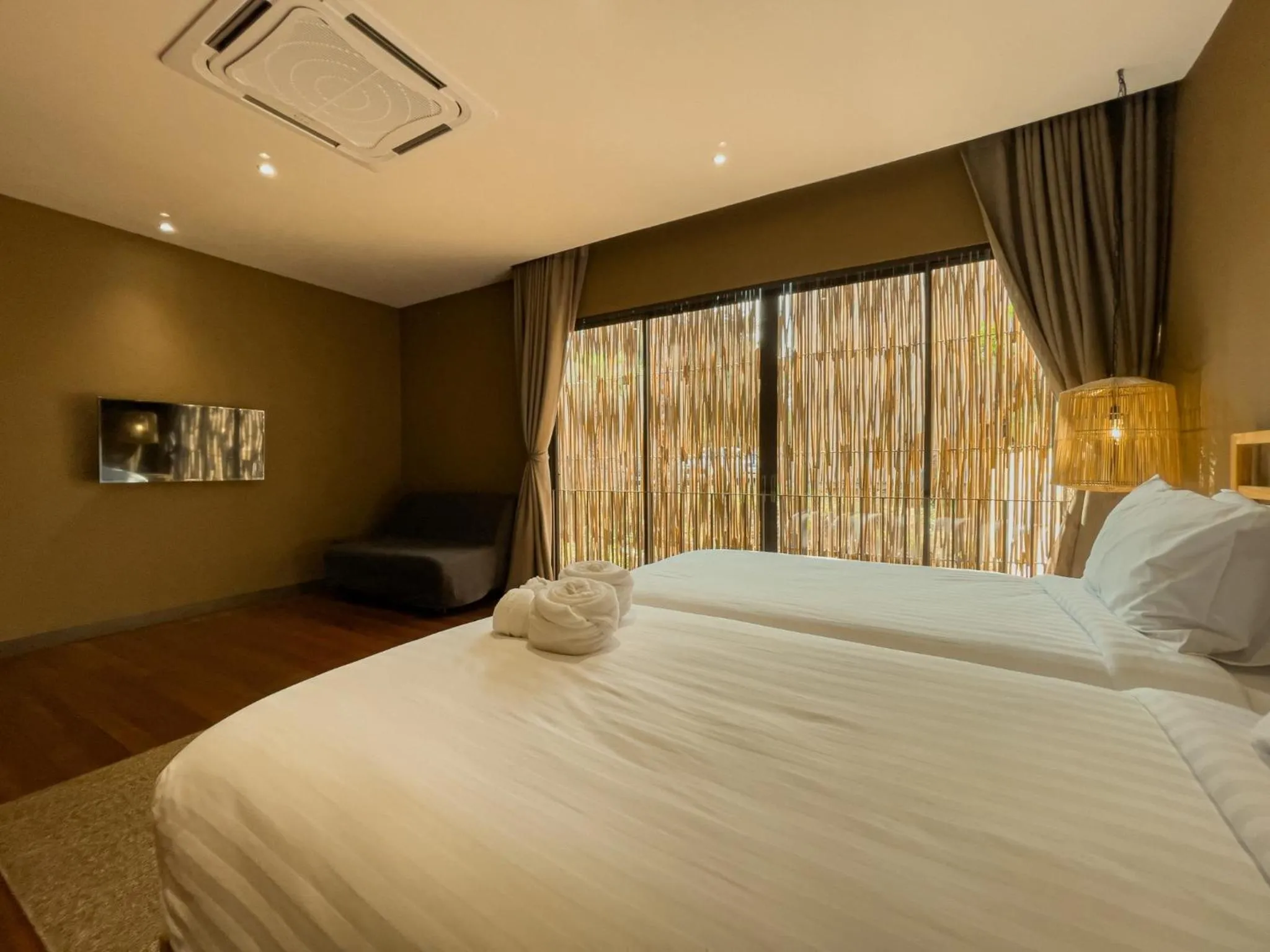 Bed in Historykan Kanchanaburi Hotel