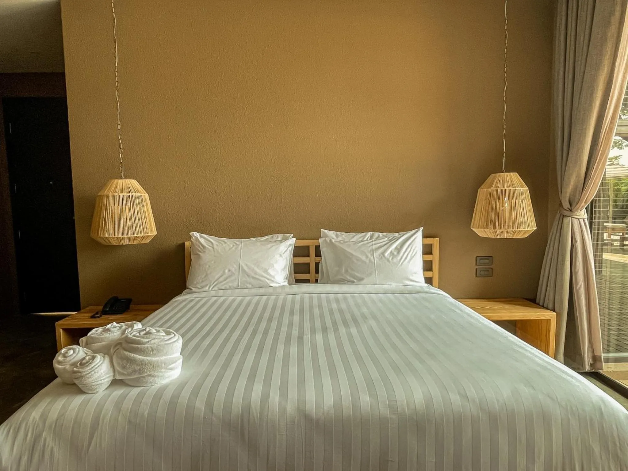 Bed in Historykan Kanchanaburi Hotel