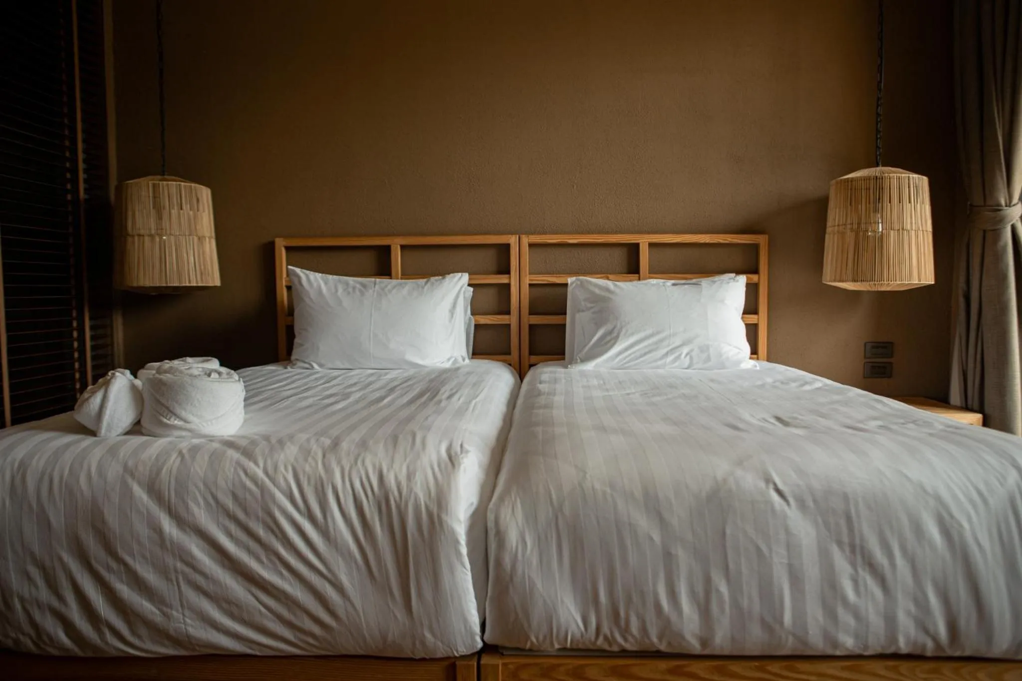 Bed in Historykan Kanchanaburi Hotel