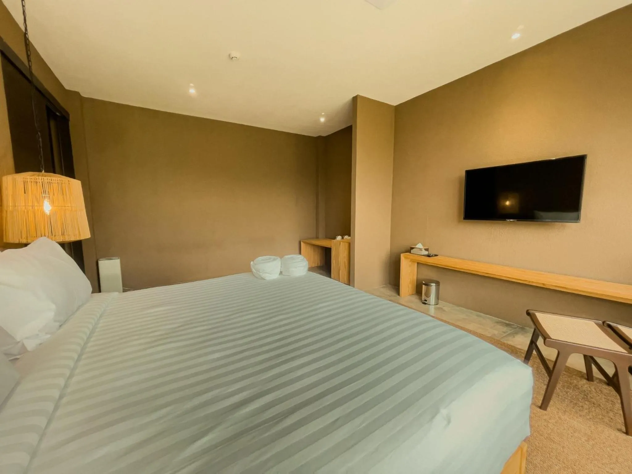 Bed in Historykan Kanchanaburi Hotel