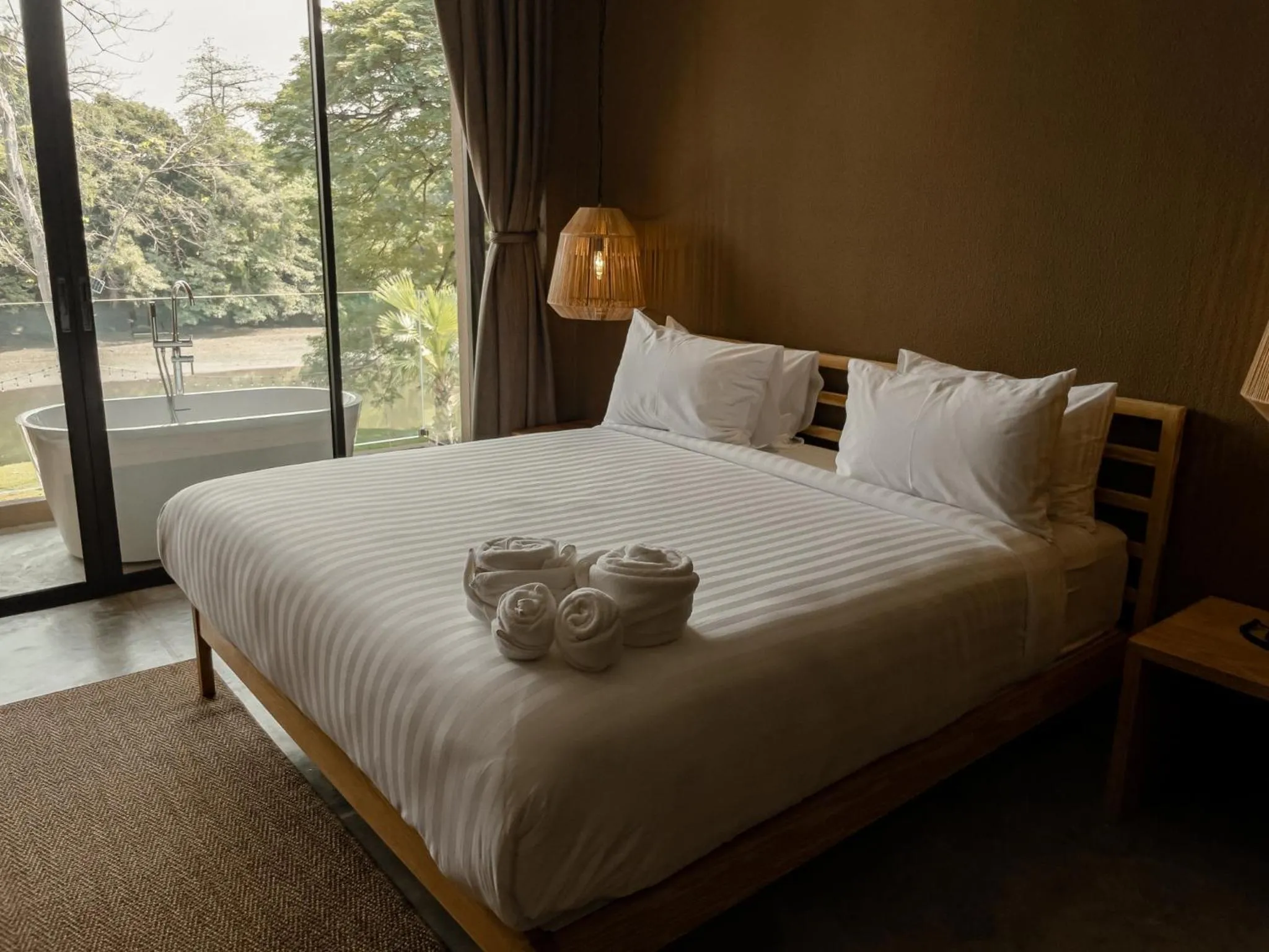 Bed in Historykan Kanchanaburi Hotel