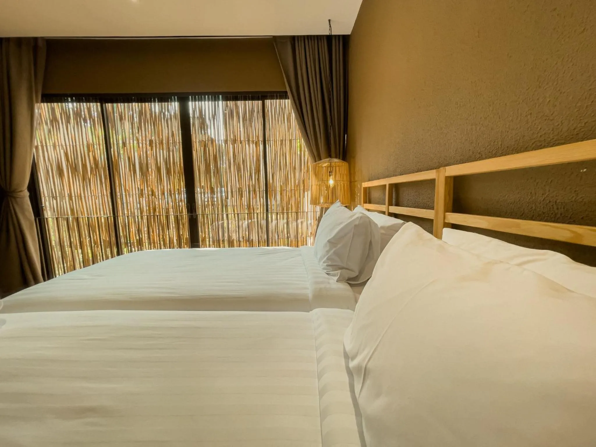 Bed in Historykan Kanchanaburi Hotel