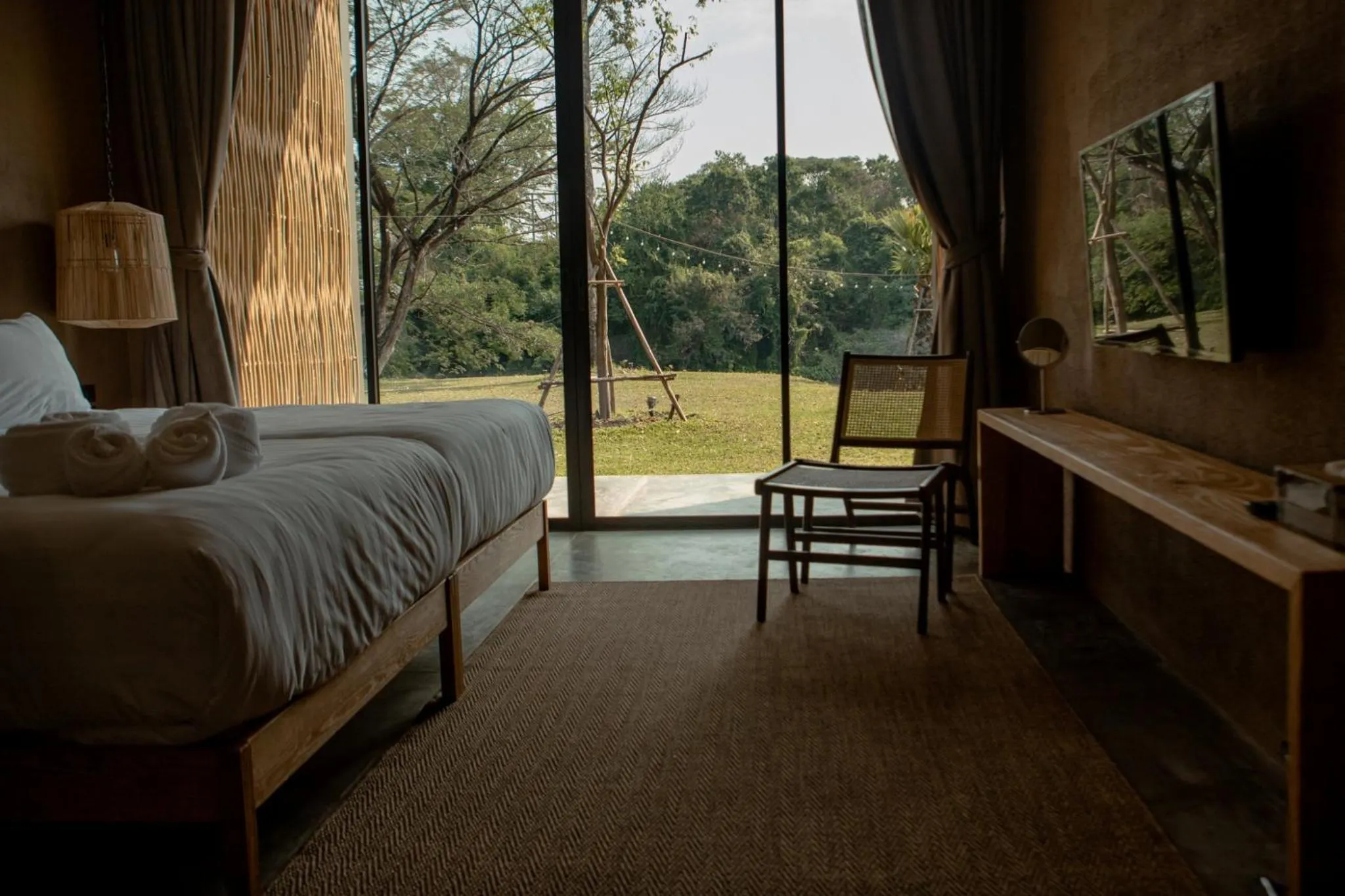 Bed in Historykan Kanchanaburi Hotel