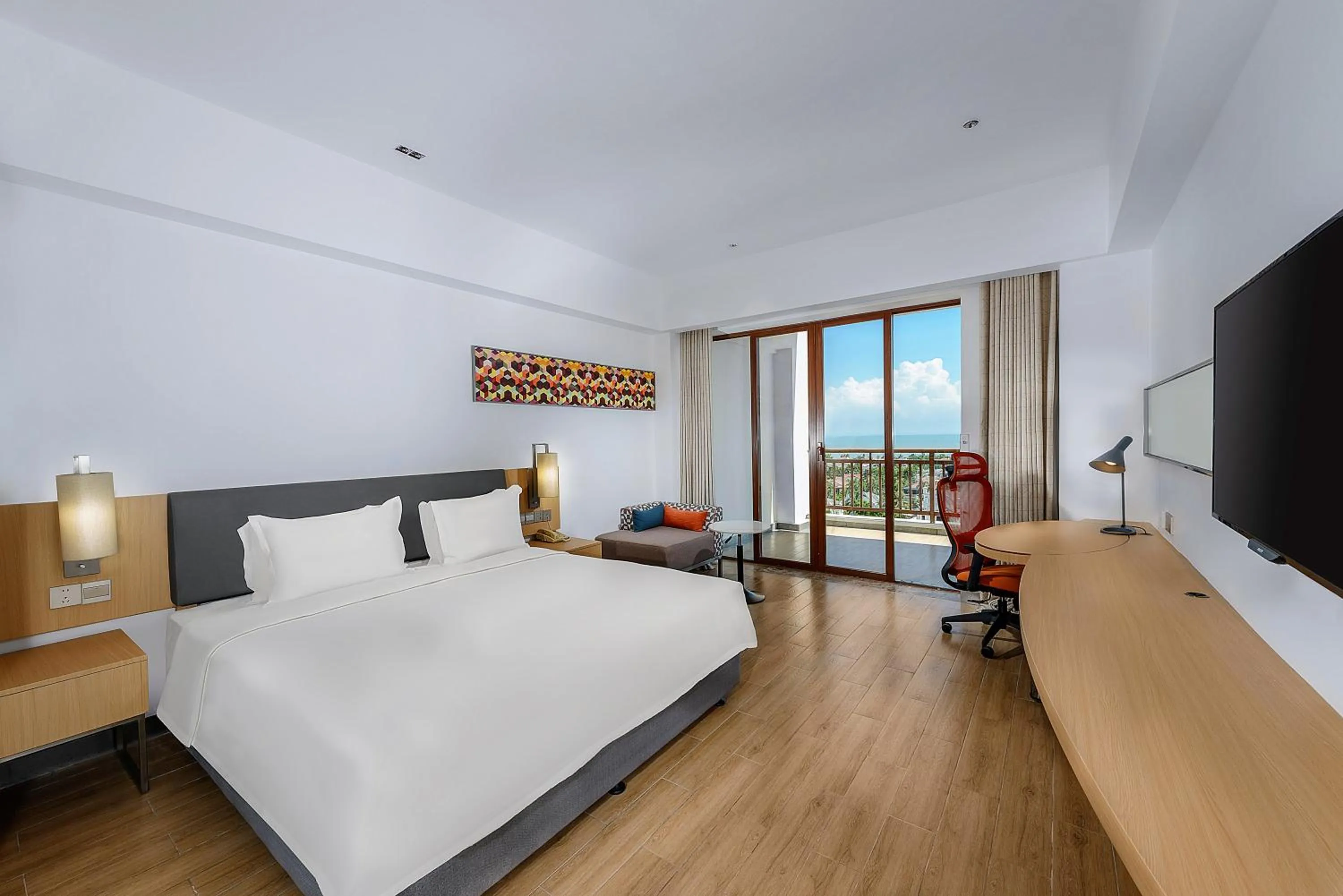 Communal lounge/ TV room, Bed in Holiday Inn Express Haikou West Coast by IHG