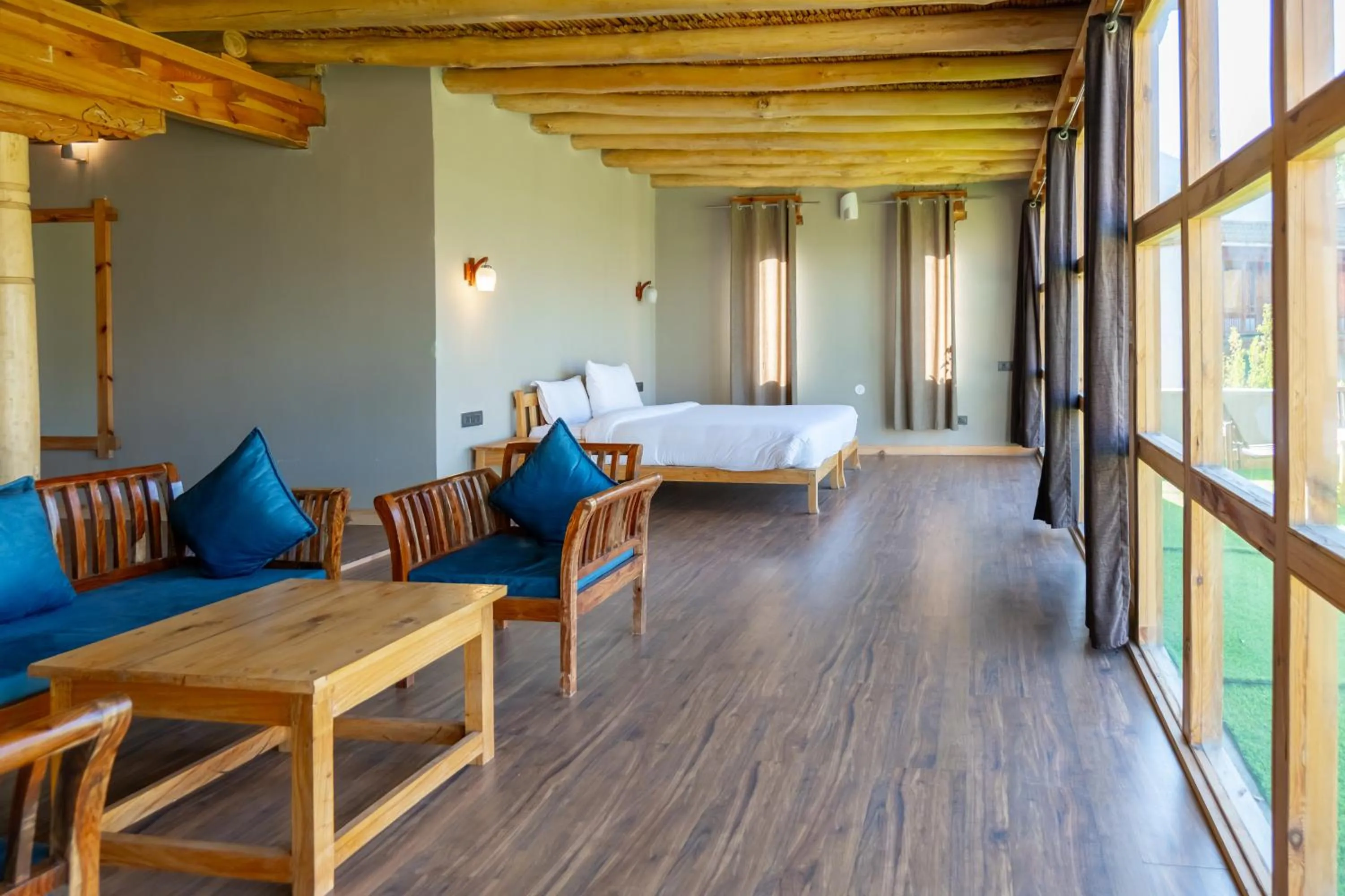 Seating area, Bed in Nubra Ecolodge