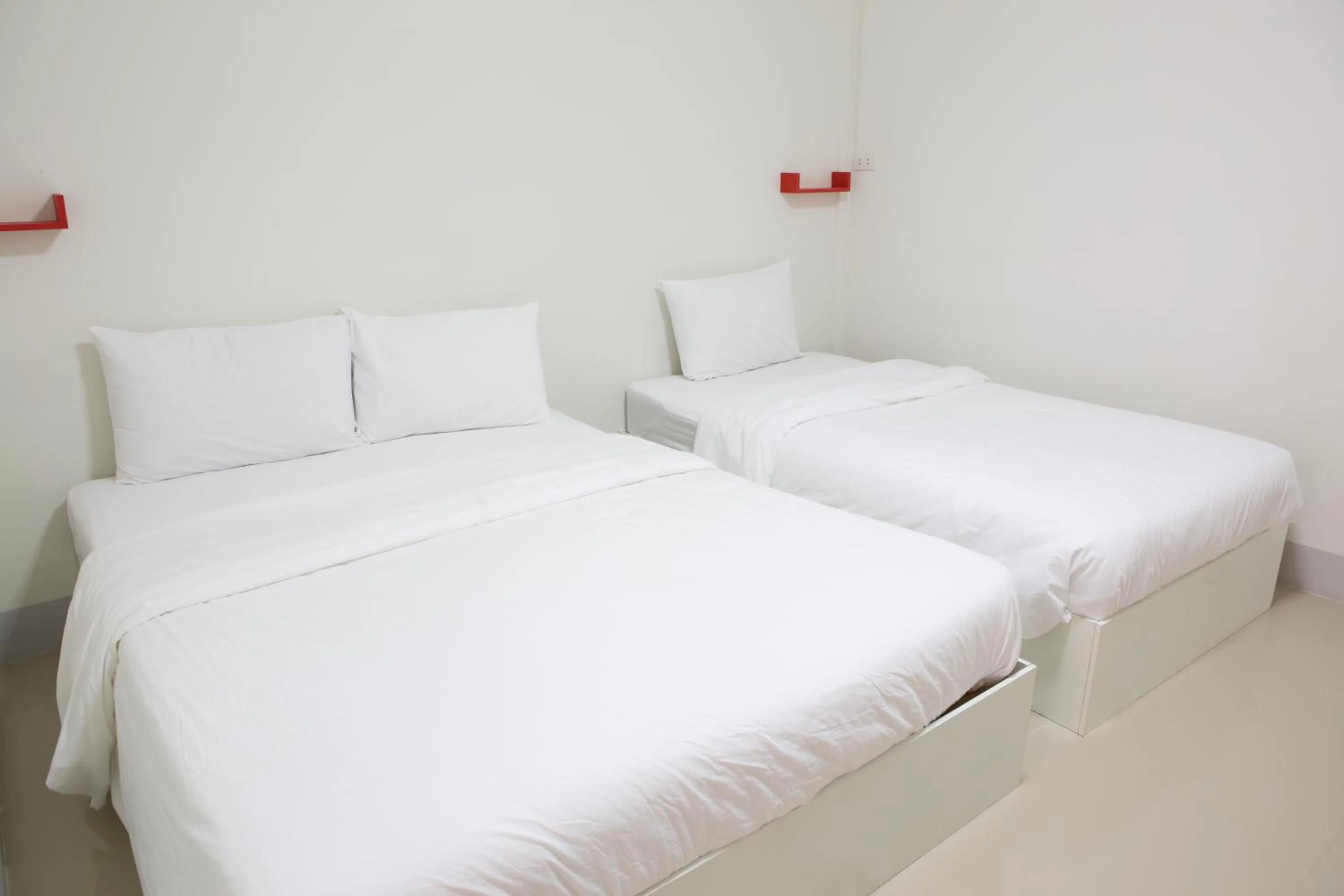 Bed in Honghub Sakon Hotel