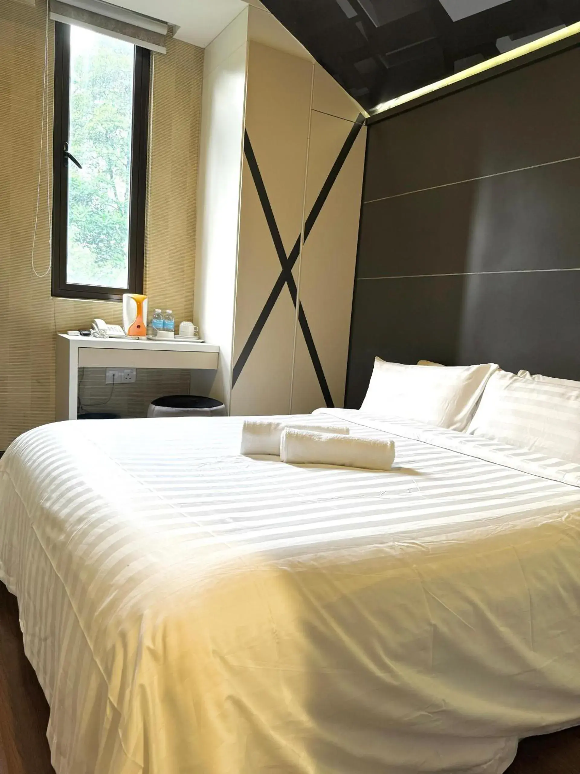 Bed in Chariton Hotel Nusa Bestari Bed in Chariton Hotel Nusa Bestari