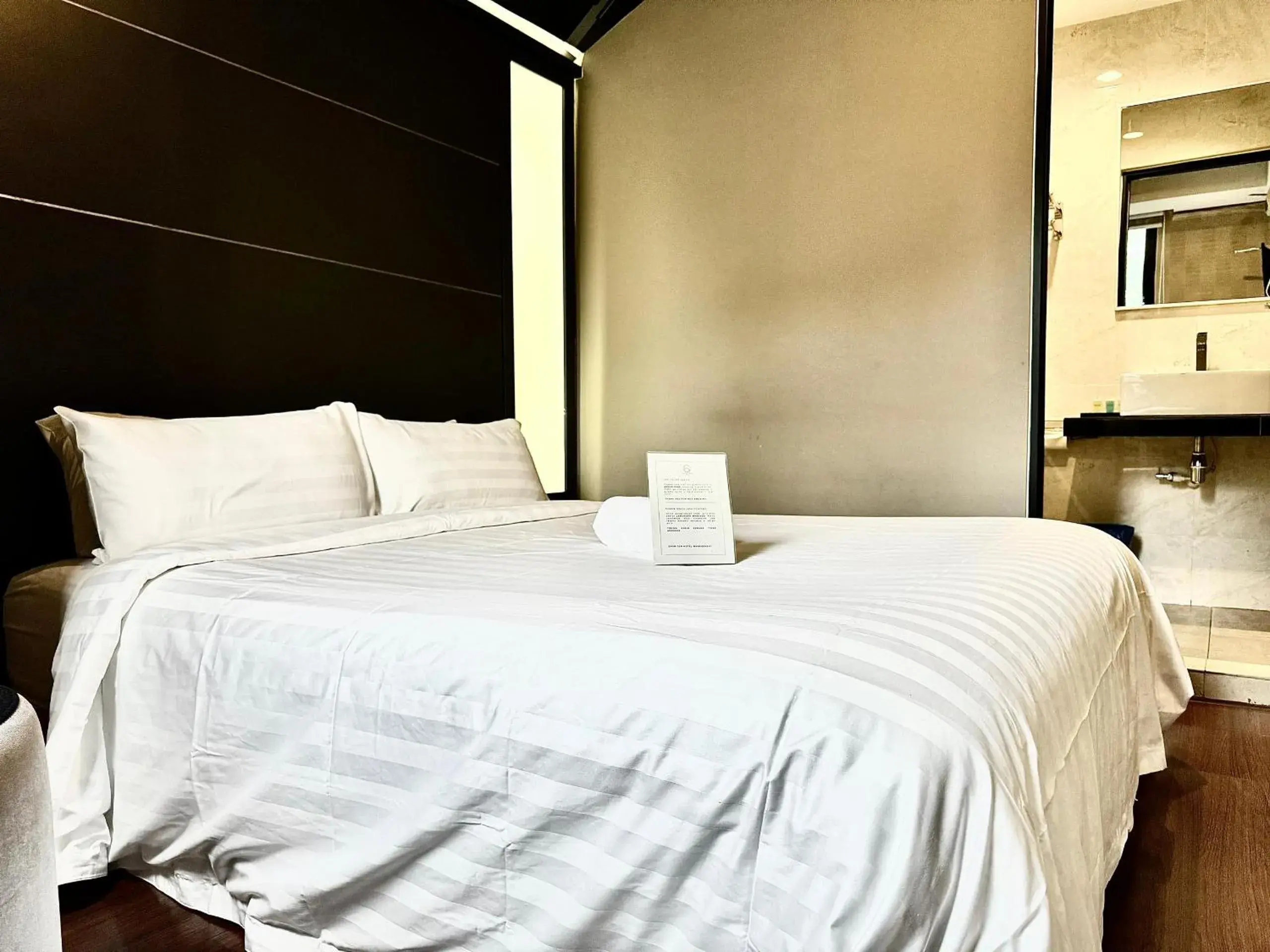Bed in Chariton Hotel Nusa Bestari Bed in Chariton Hotel Nusa Bestari