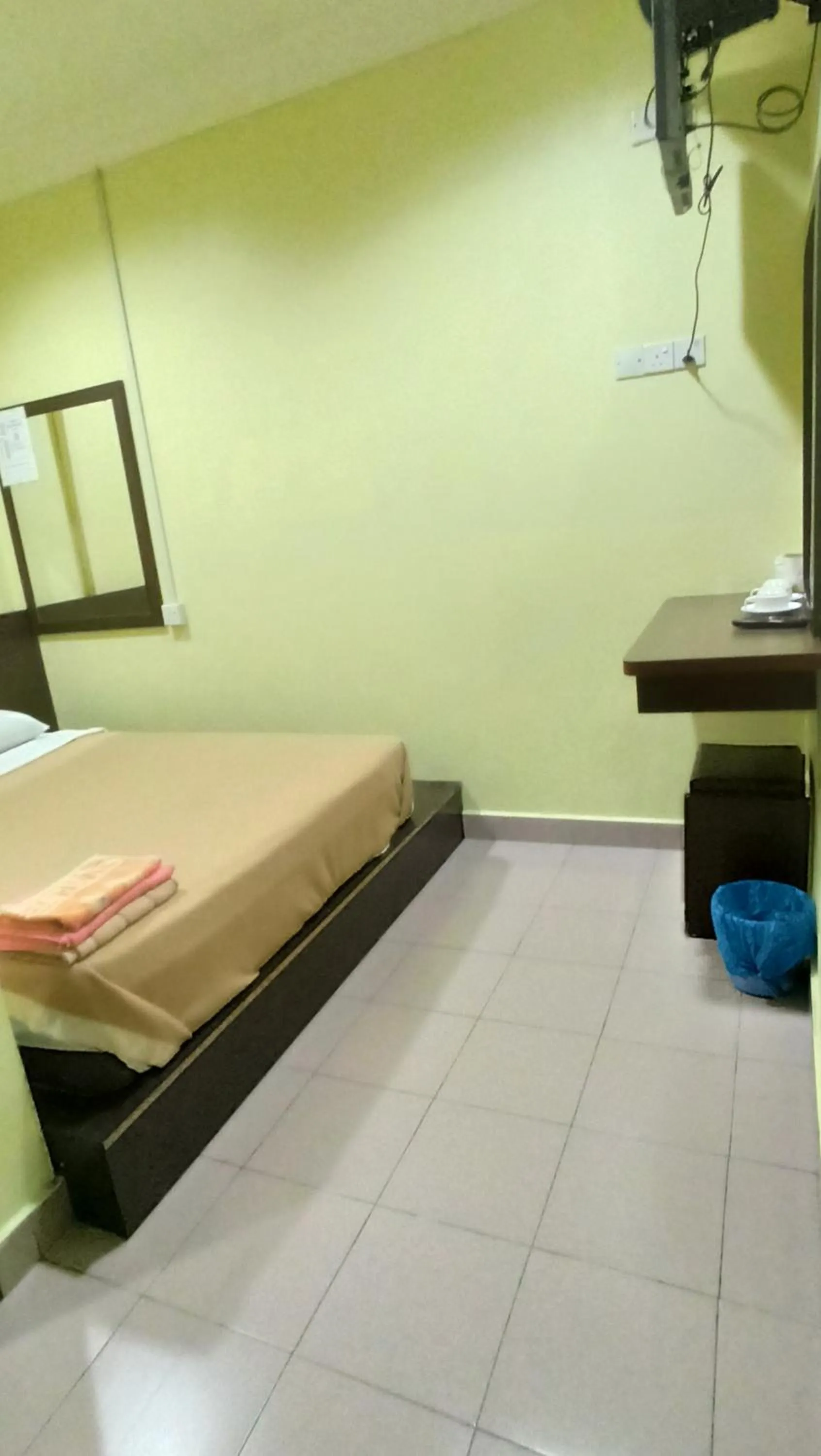 Bed in Ria Cameron Hotel