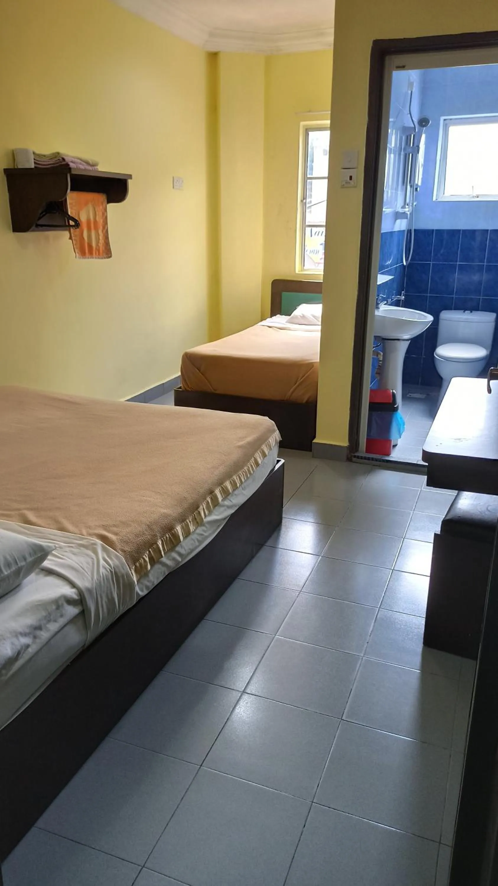 Bed in Ria Cameron Hotel