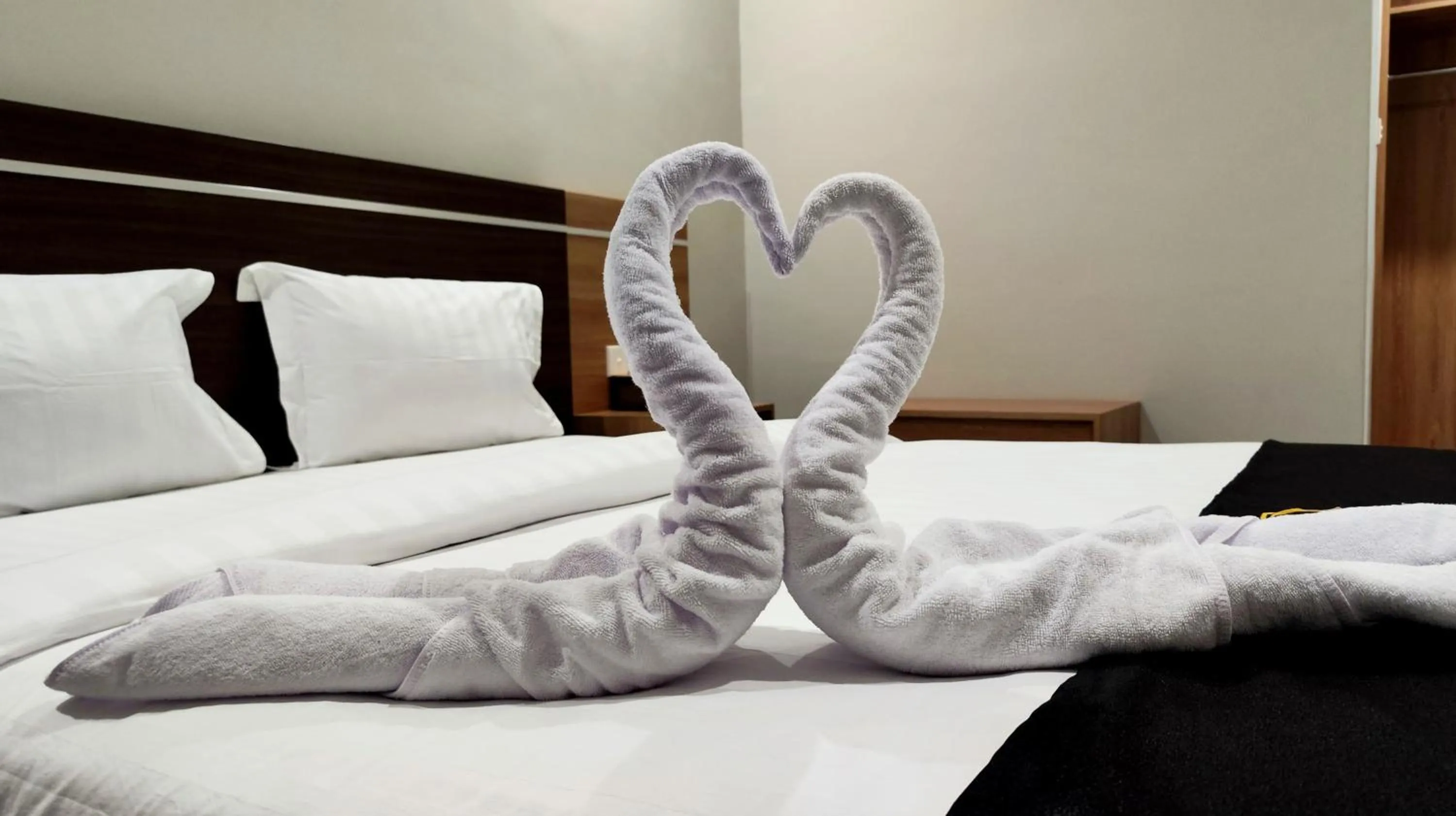 Bed in Nio Garden Hotel