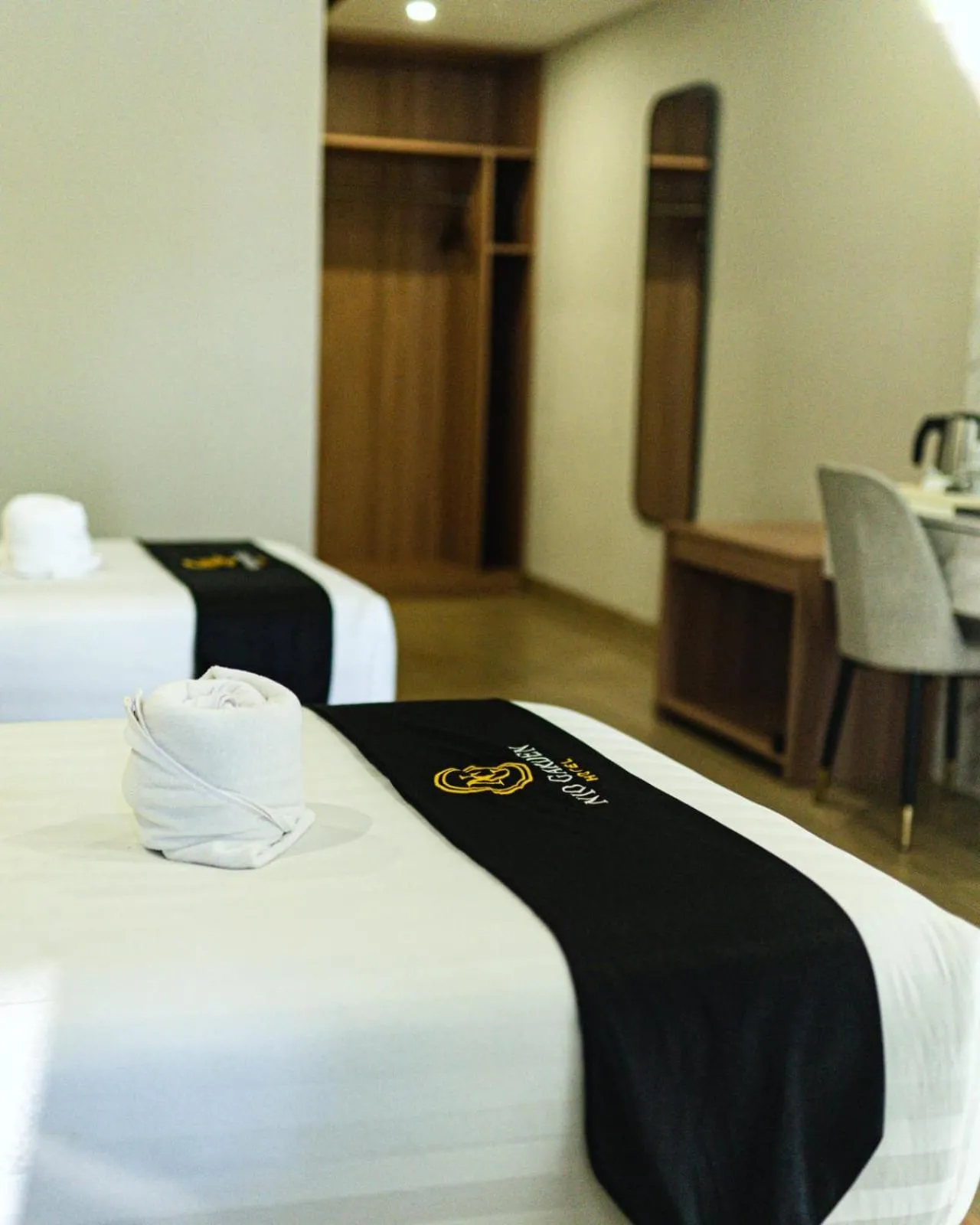 Bed in Nio Garden Hotel