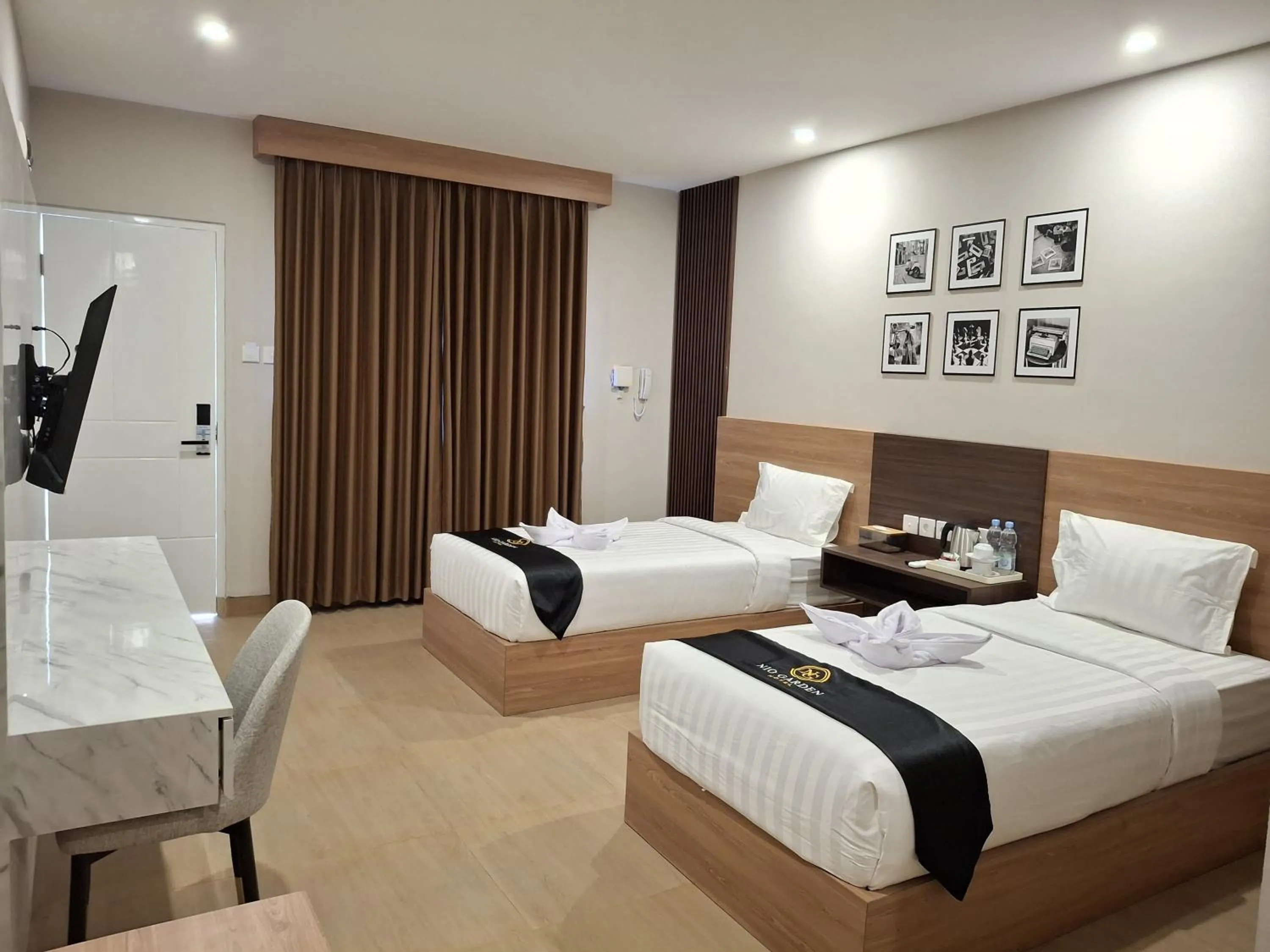 Bed in Nio Garden Hotel