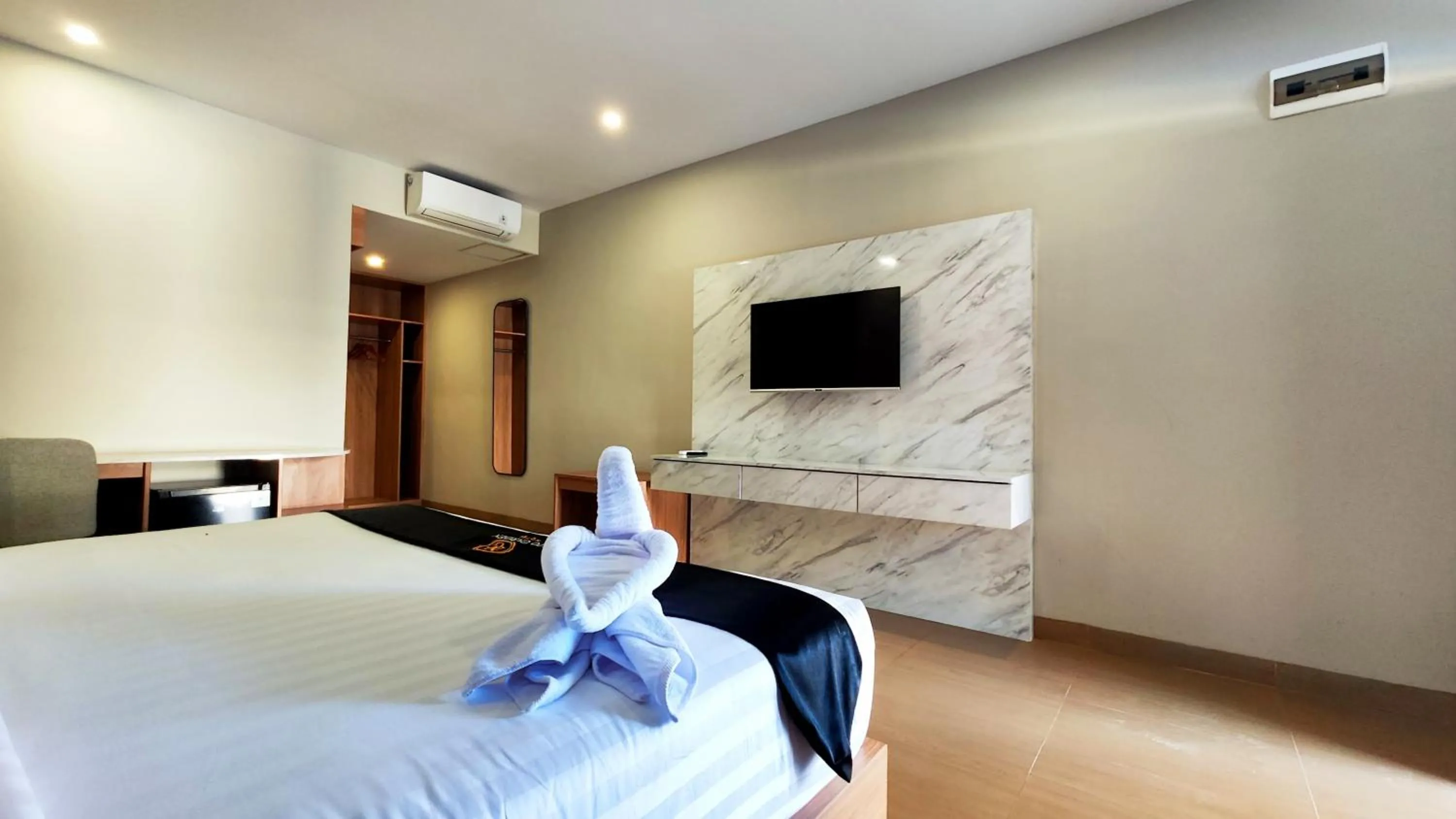Bed in Nio Garden Hotel