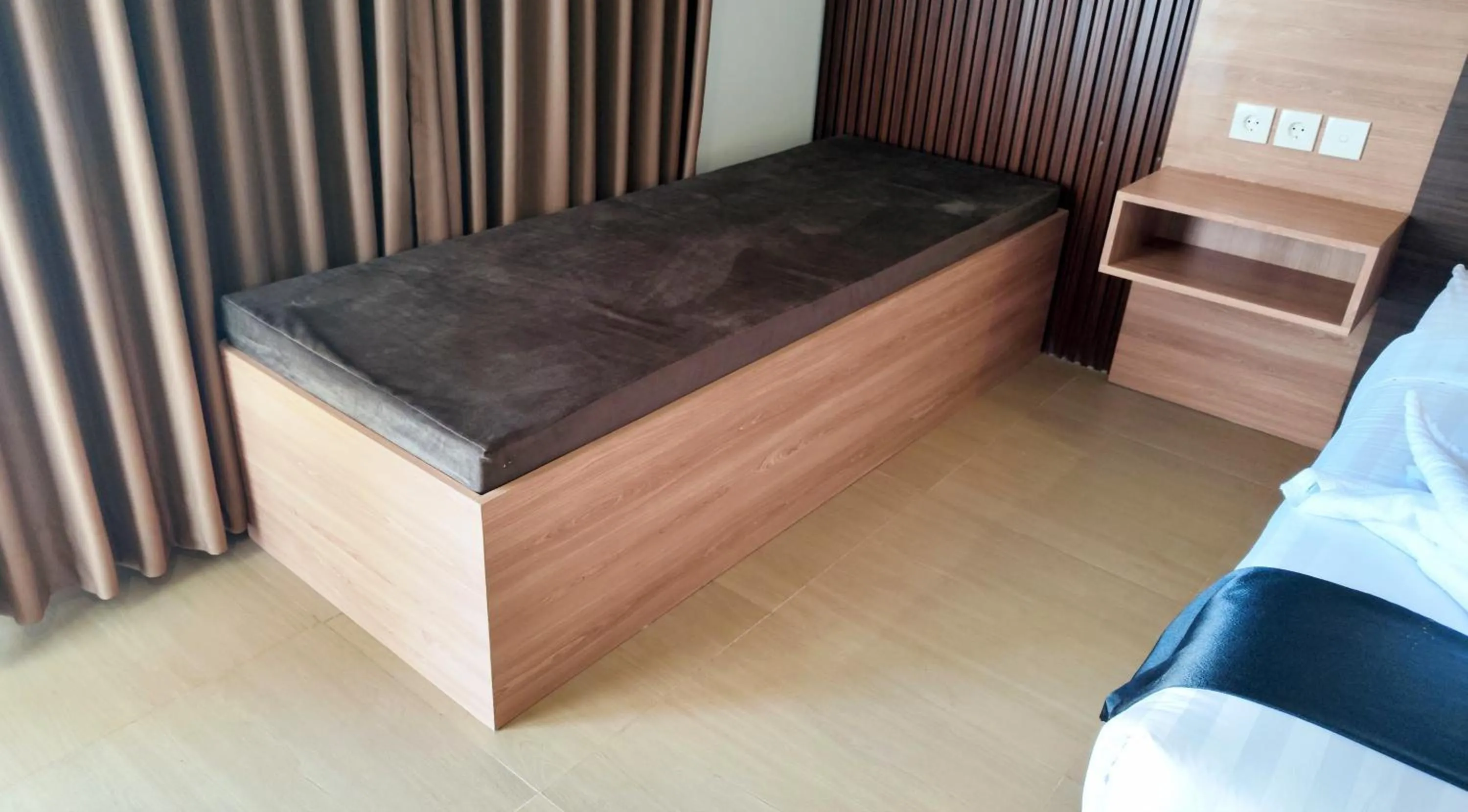 Bed in Nio Garden Hotel