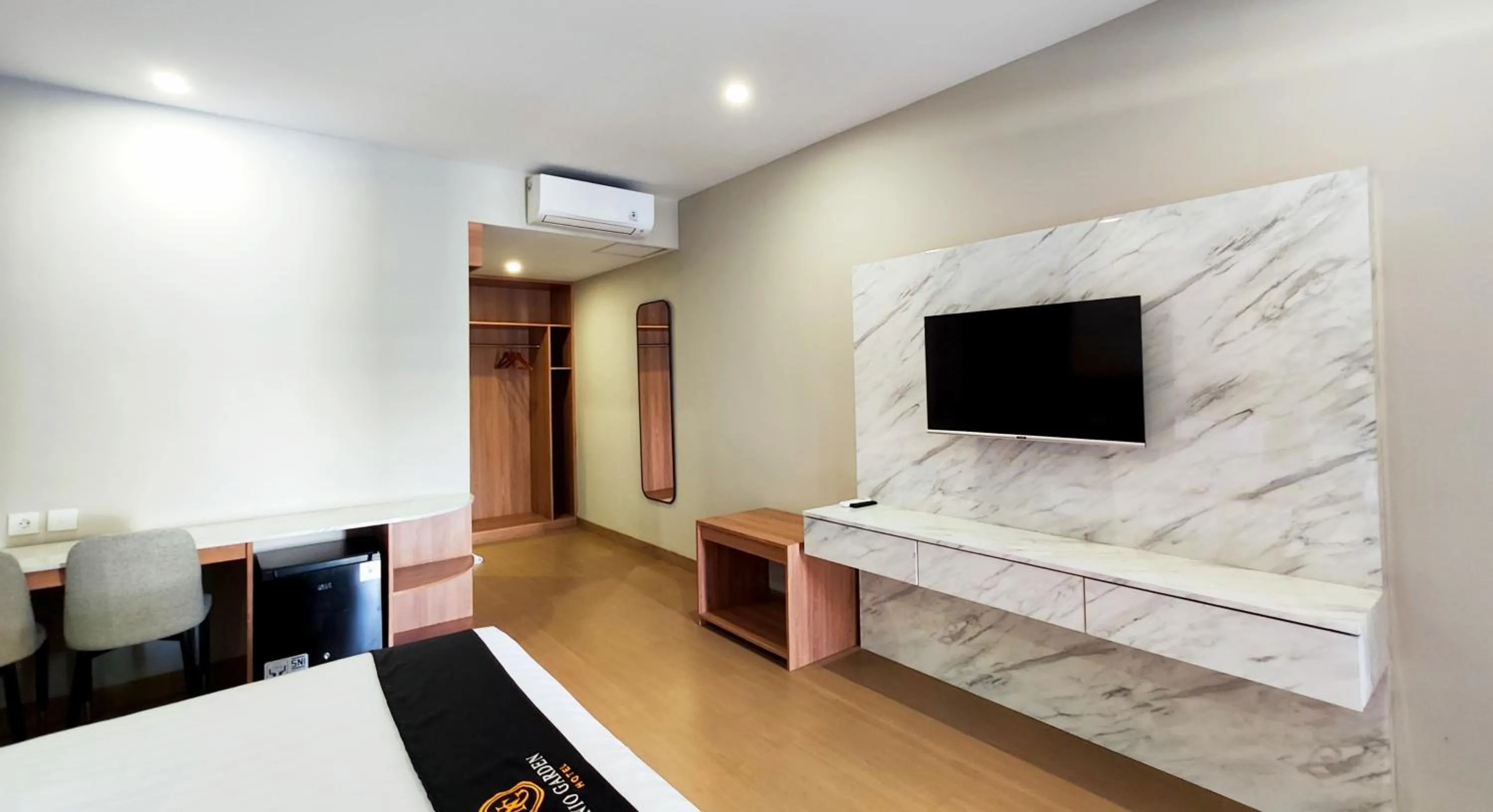 Bed in Nio Garden Hotel