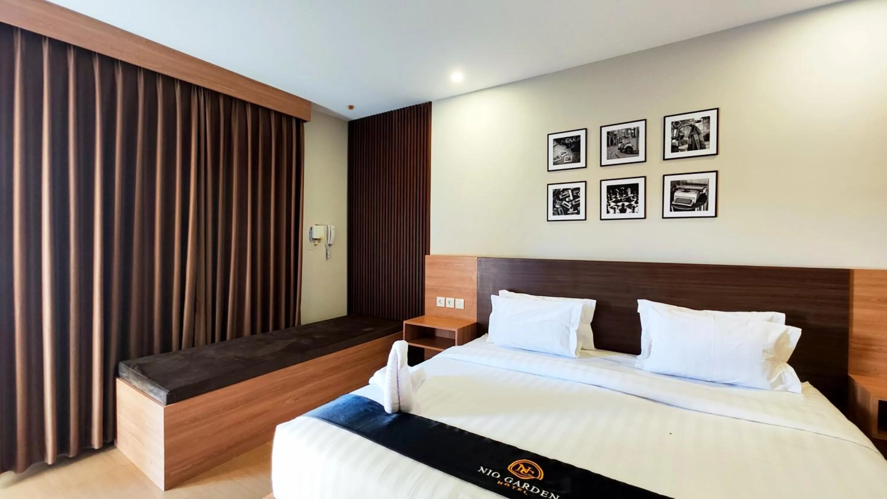 Bed in Nio Garden Hotel