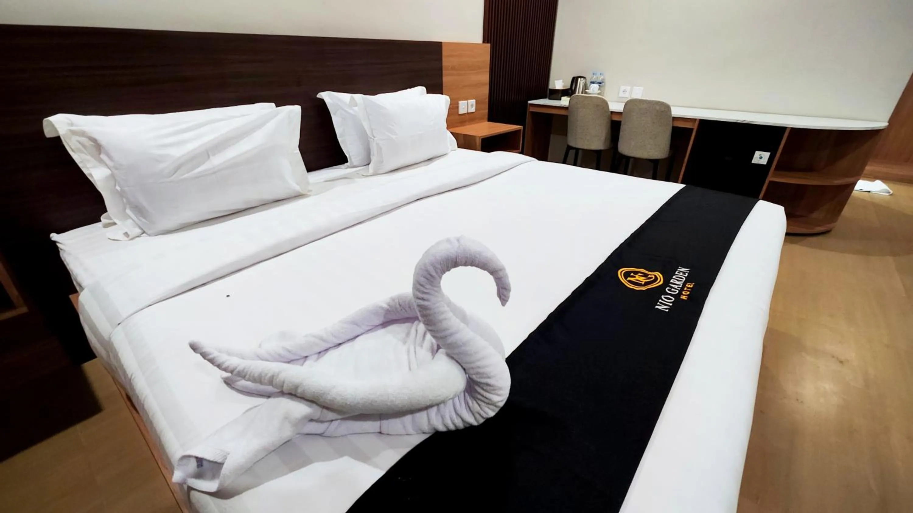 Bed in Nio Garden Hotel