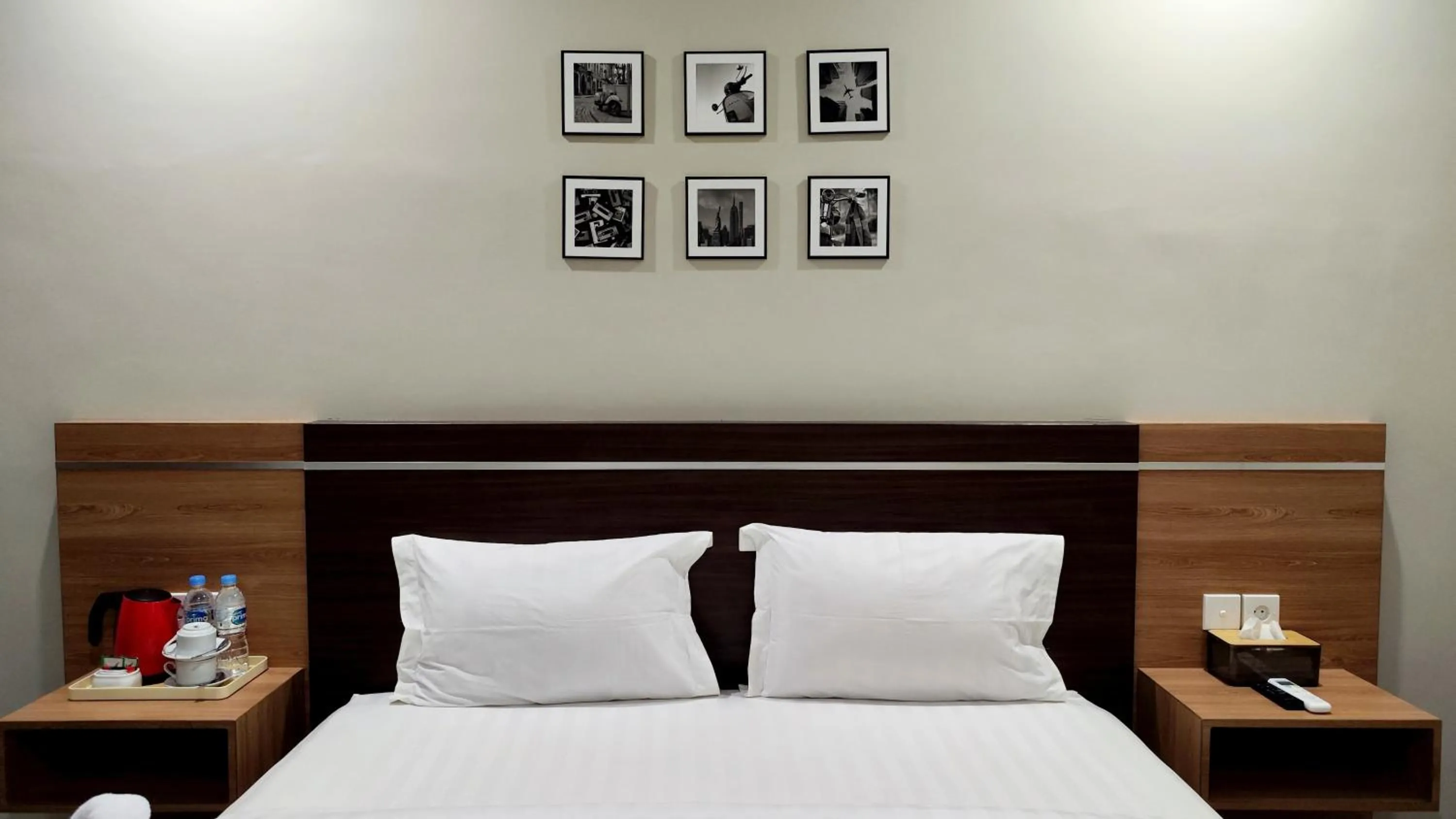 Bed in Nio Garden Hotel