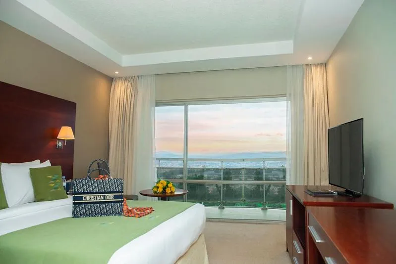 Bed in Hotel des Mille Collines