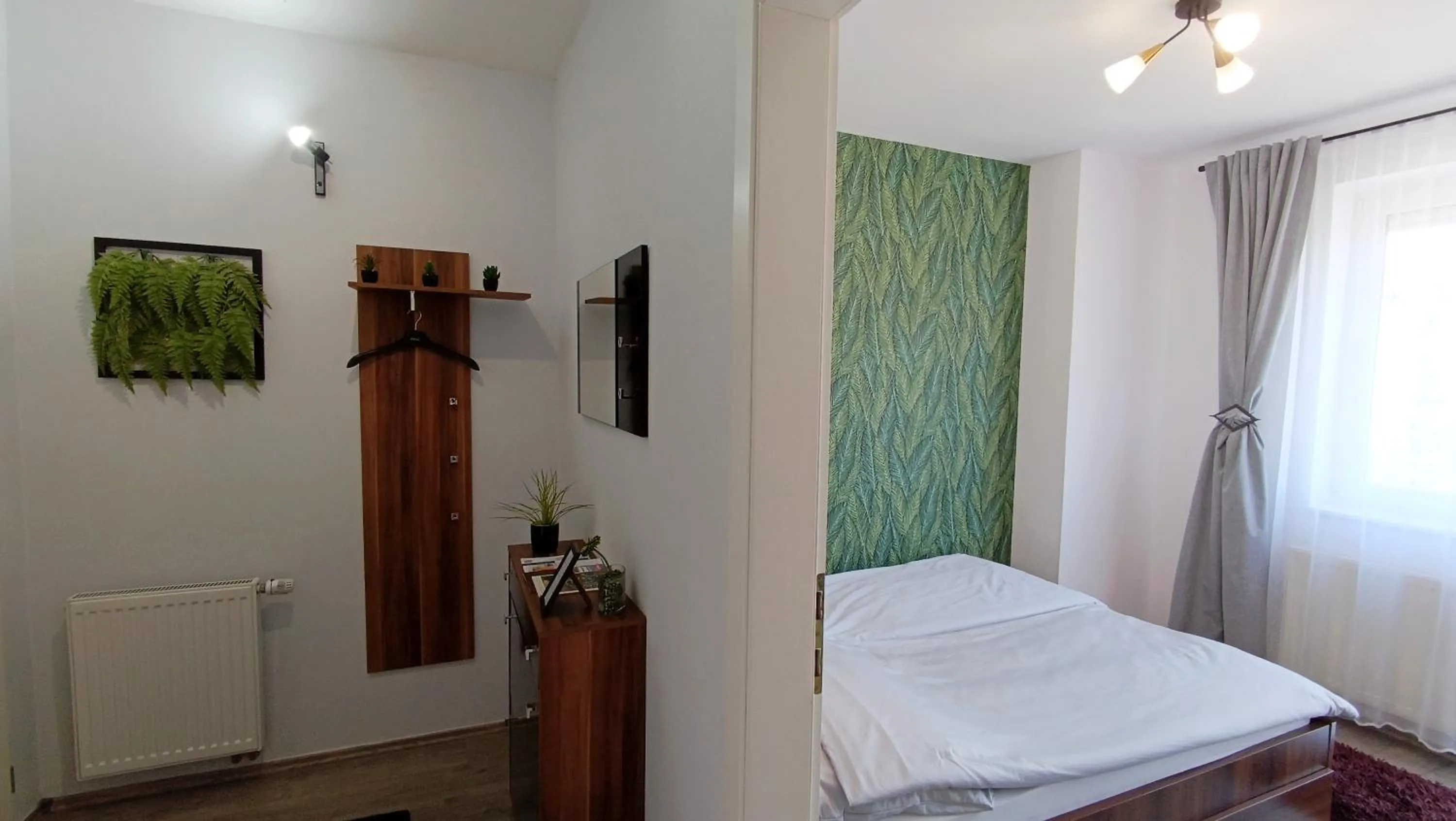 Bed in Nidius Apartment