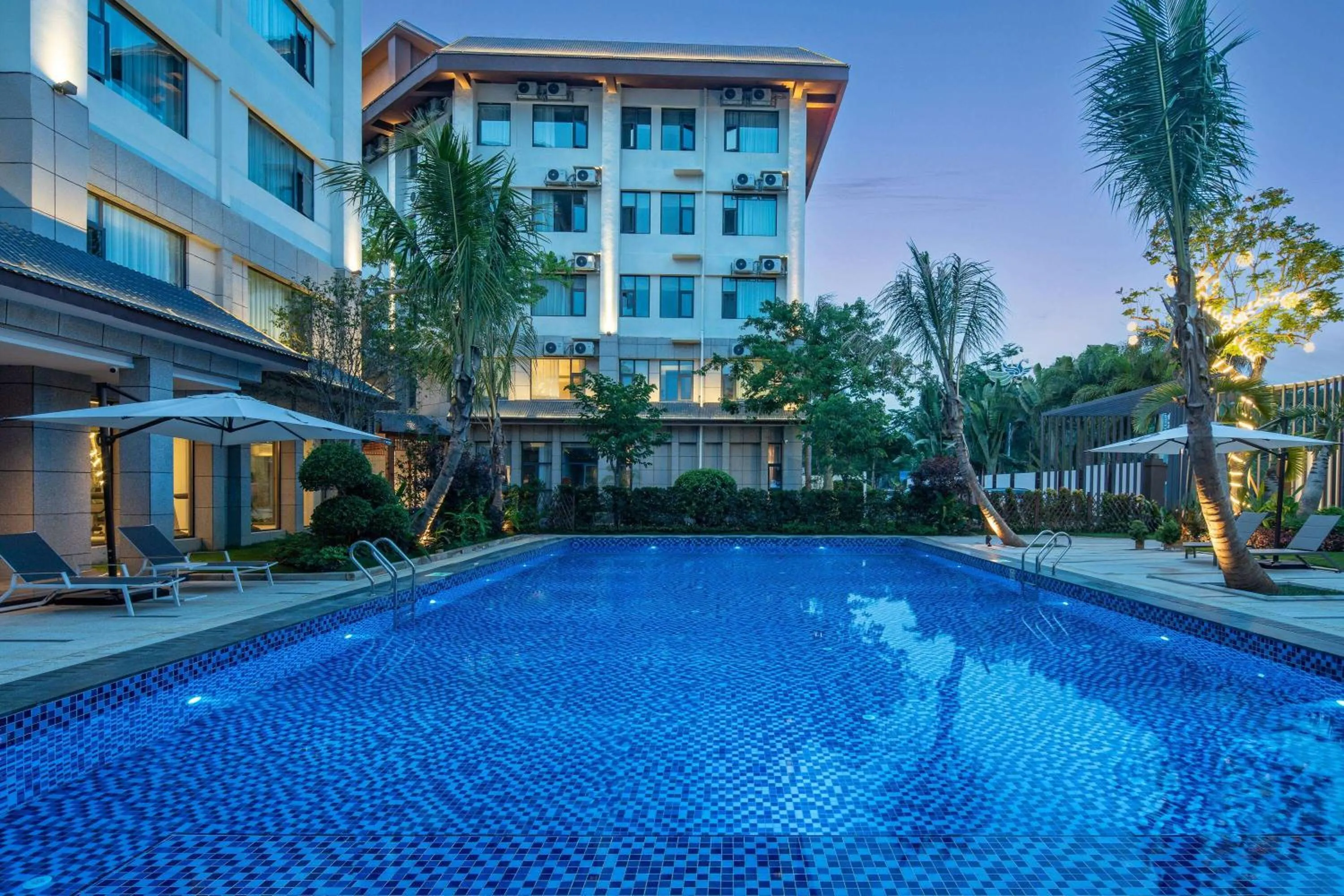 Pool view in Hawthorn by Wyndham Xishuang Banna Jinghong