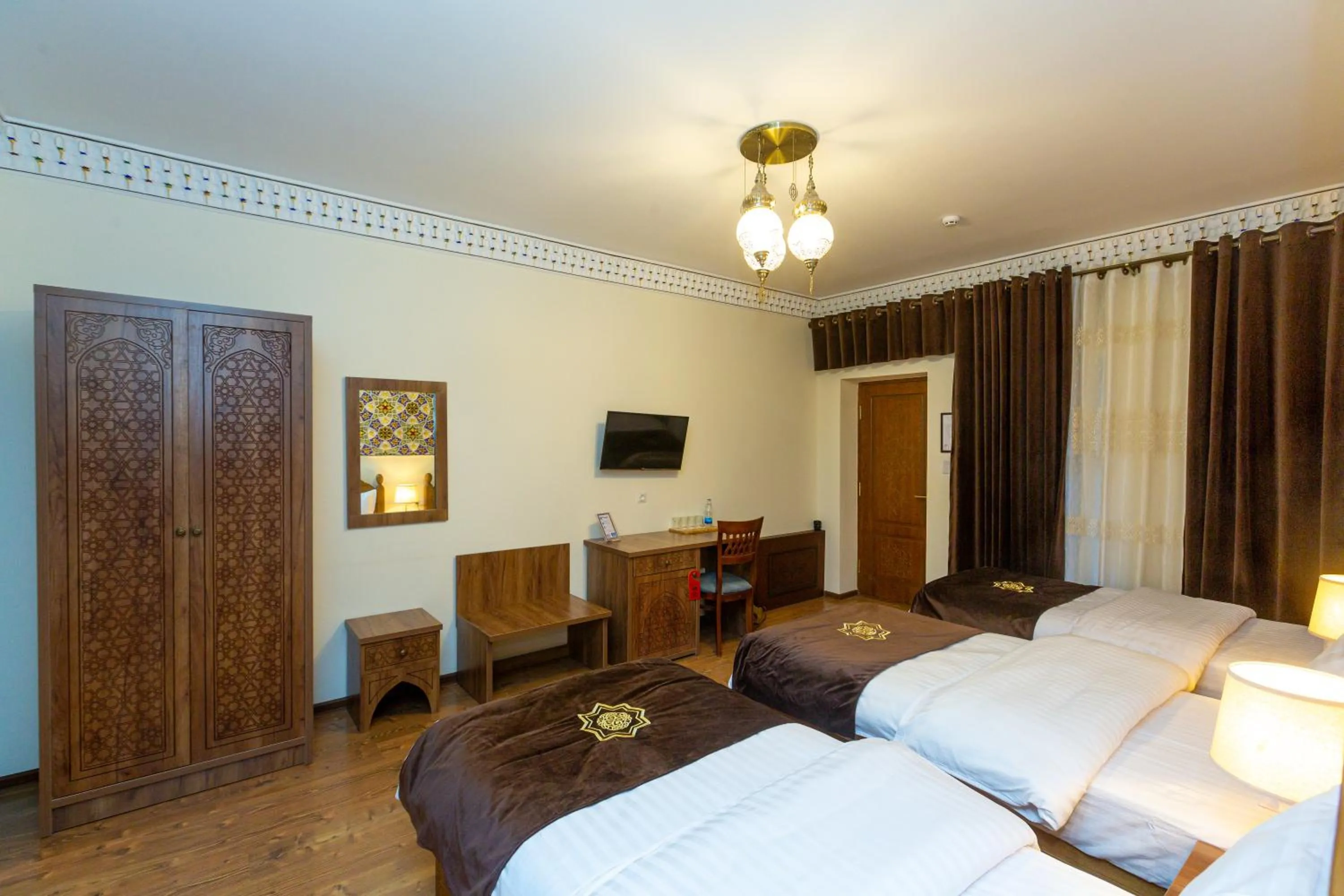 Bed in Iman Hotel