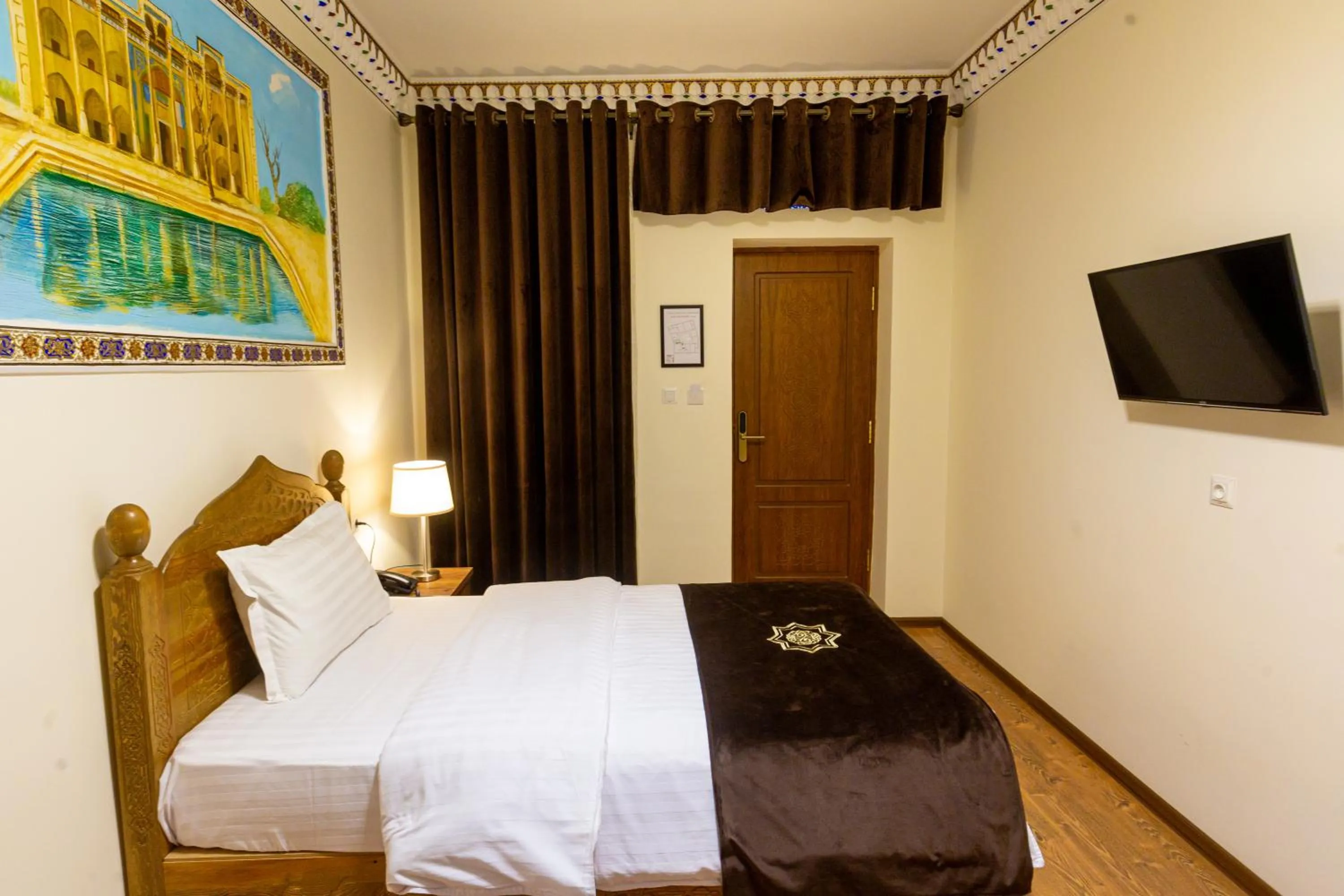 Bed in Iman Hotel