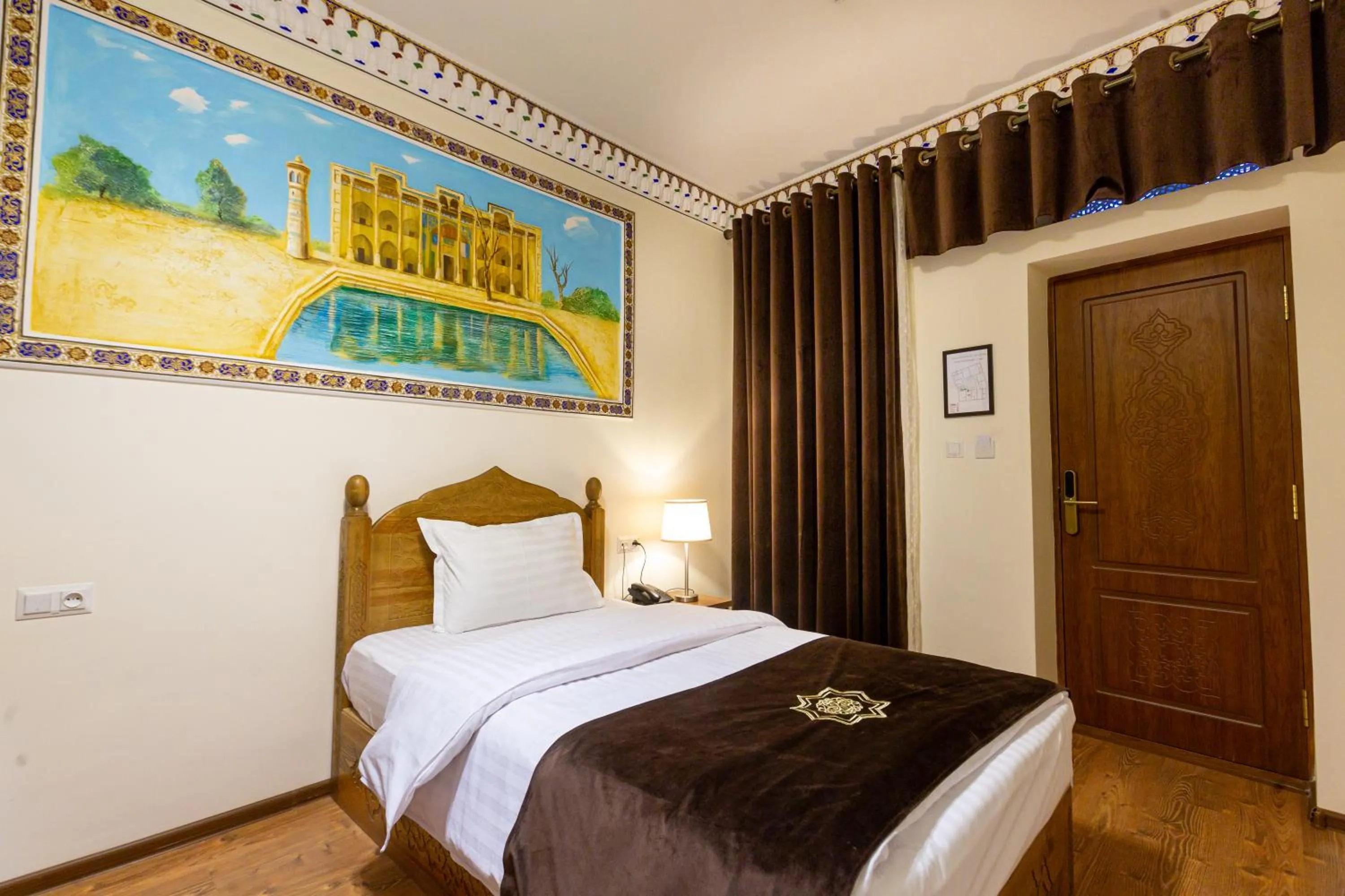 Bed in Iman Hotel