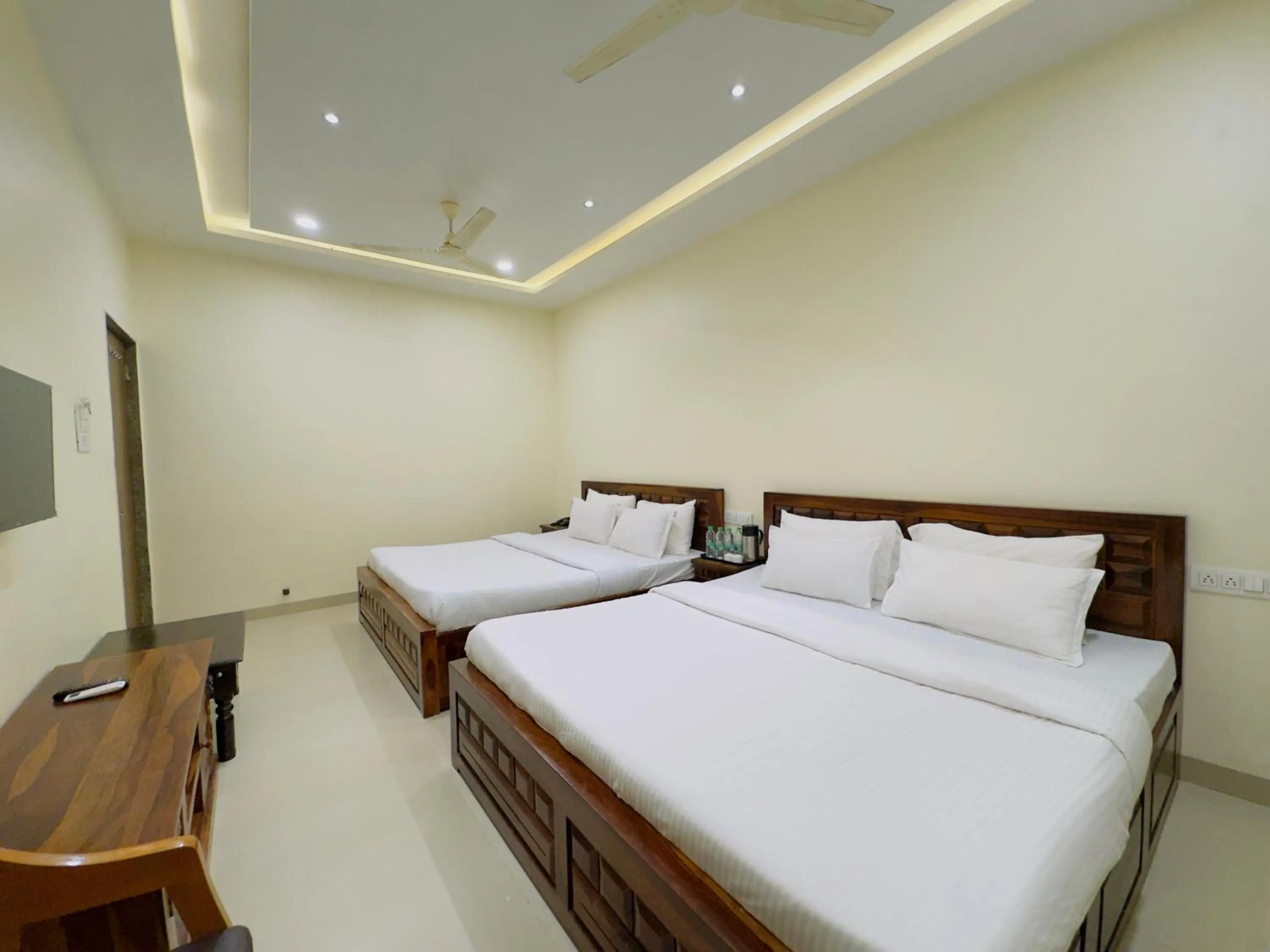 Bedroom, Bed in Hotel Jyotirlinga- One Way Drop to Mahakal Temple