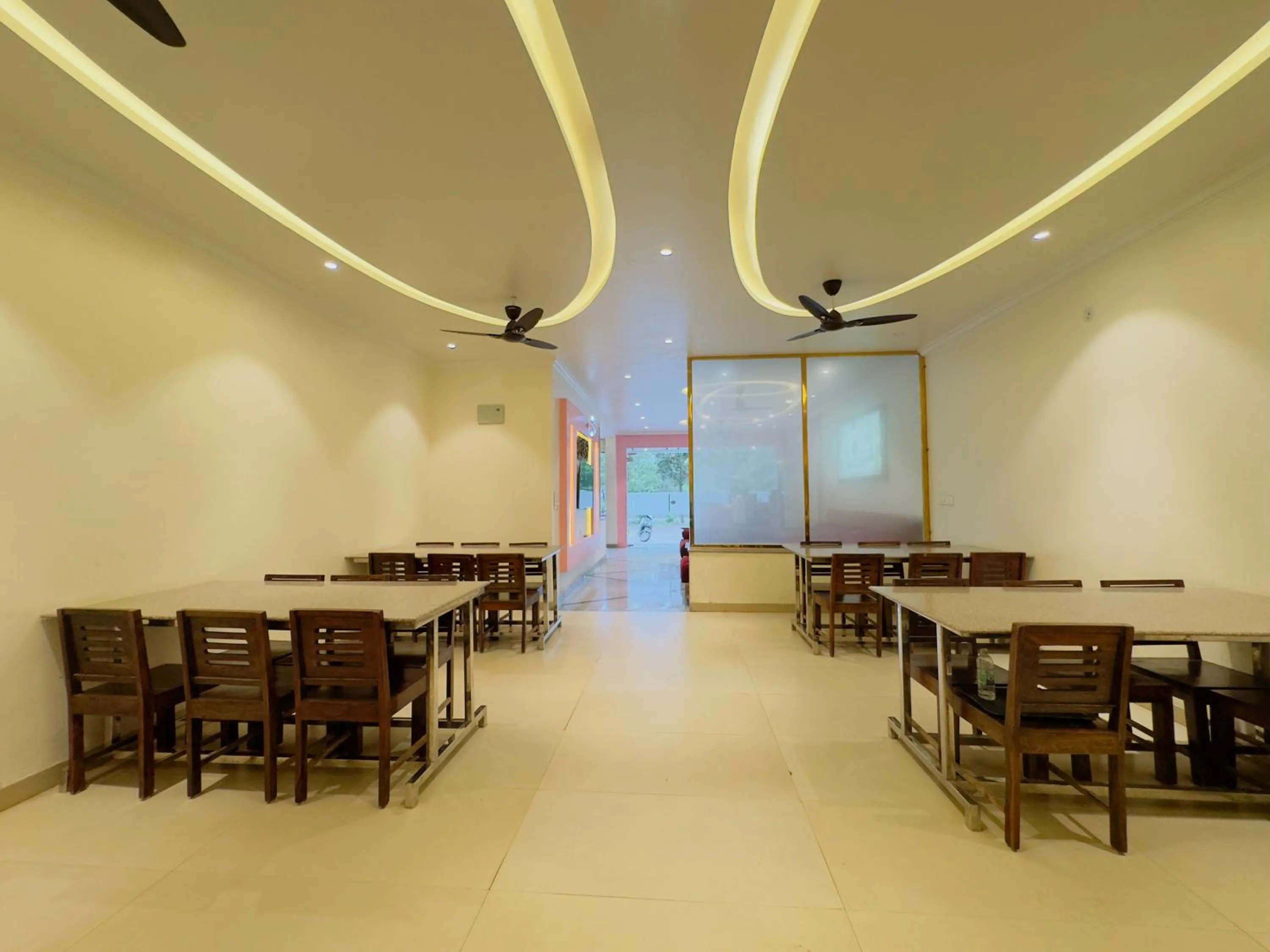 Dining area in Hotel Jyotirlinga- One Way Drop to Mahakal Temple