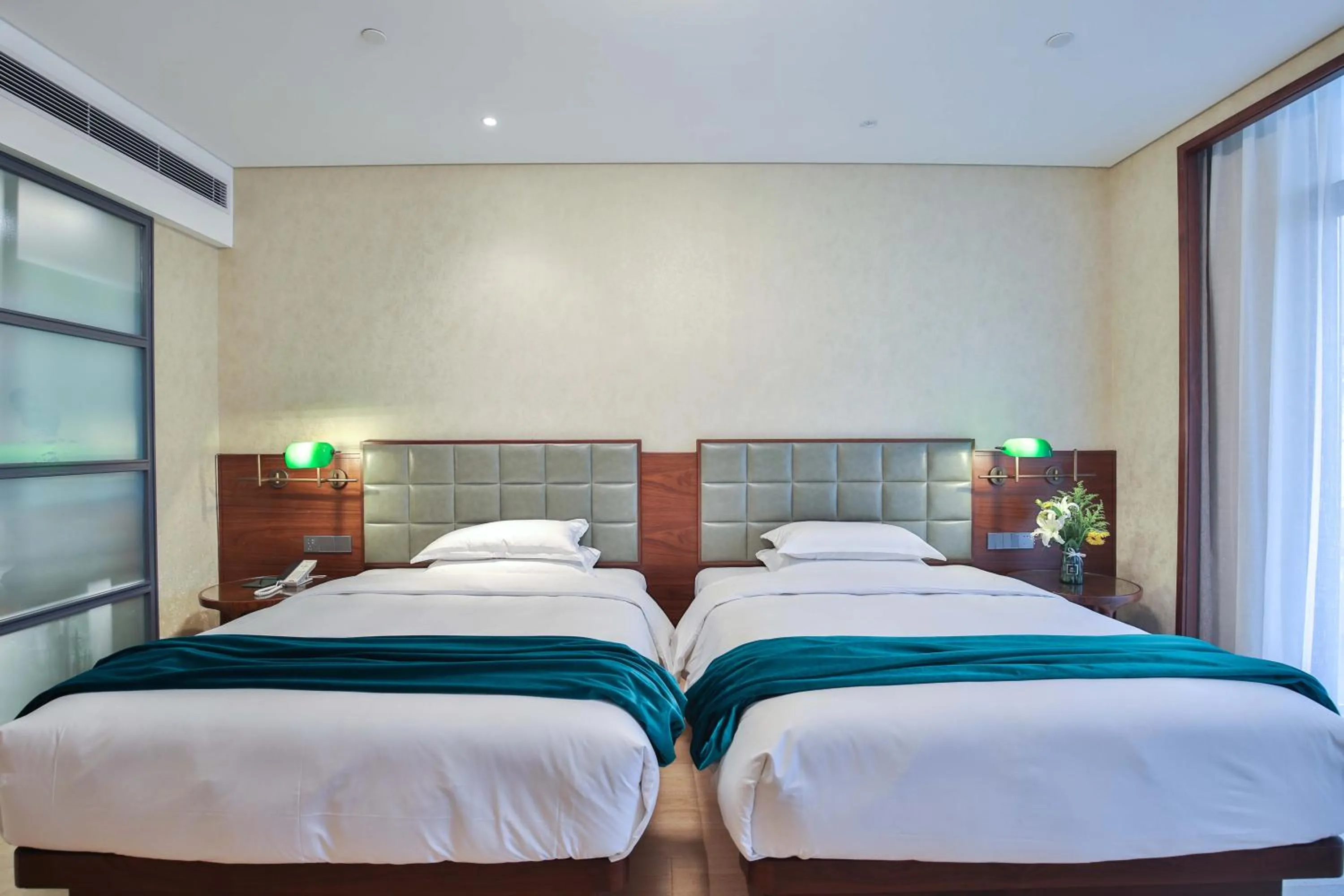 Bed in SSAW Garden Hotel Ningbo Xikou
