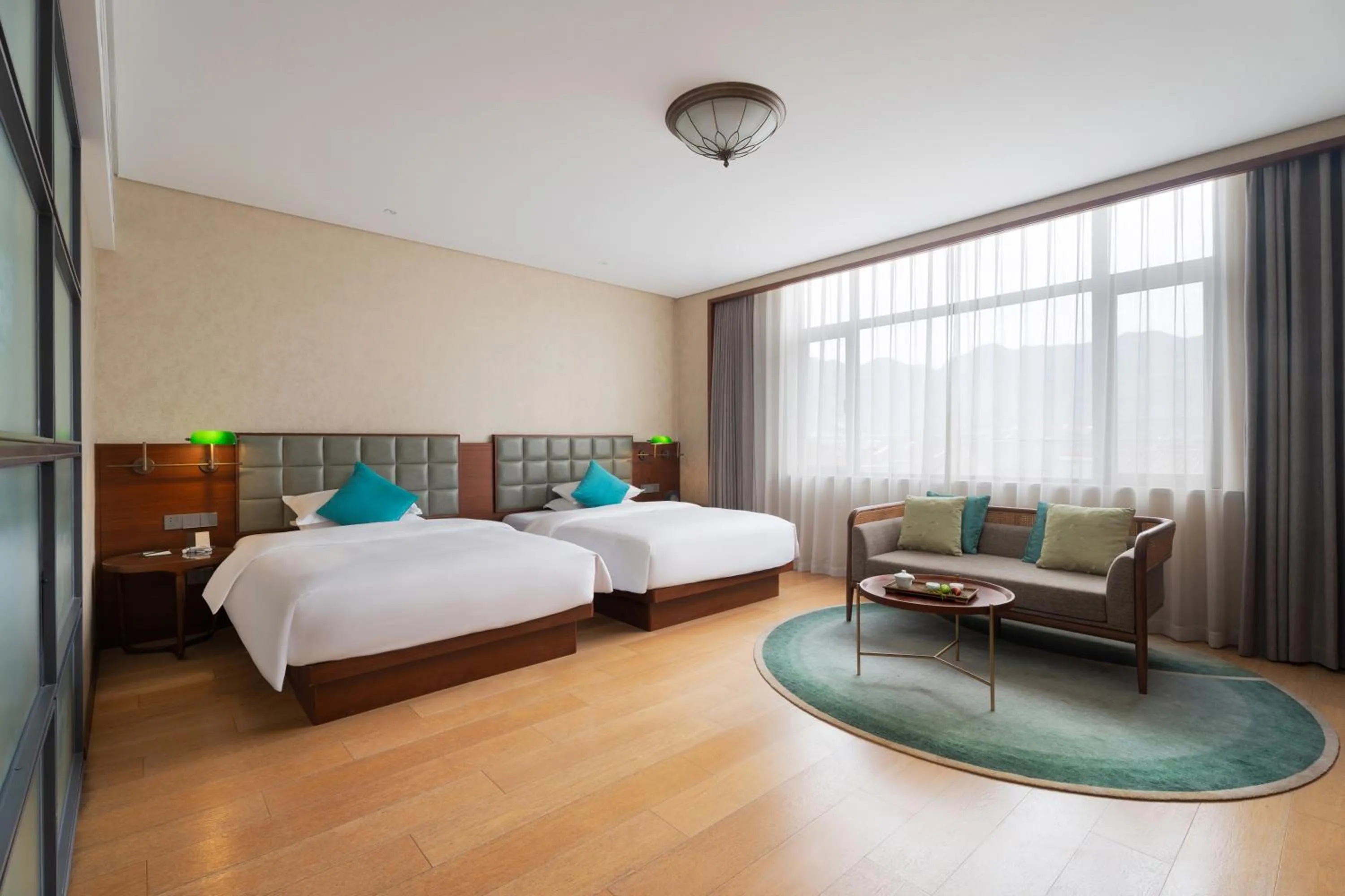 Bed in SSAW Garden Hotel Ningbo Xikou