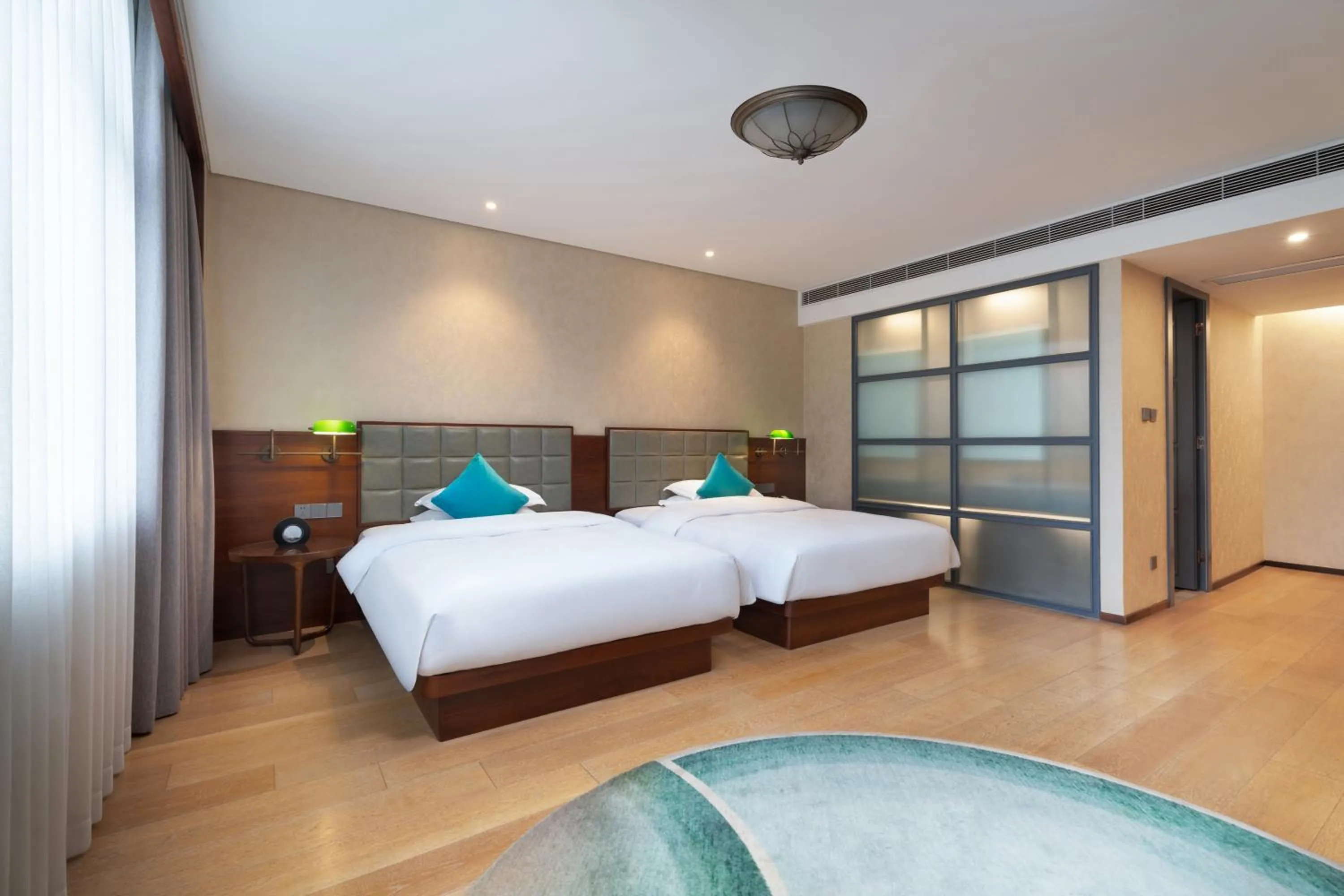 Bed in SSAW Garden Hotel Ningbo Xikou