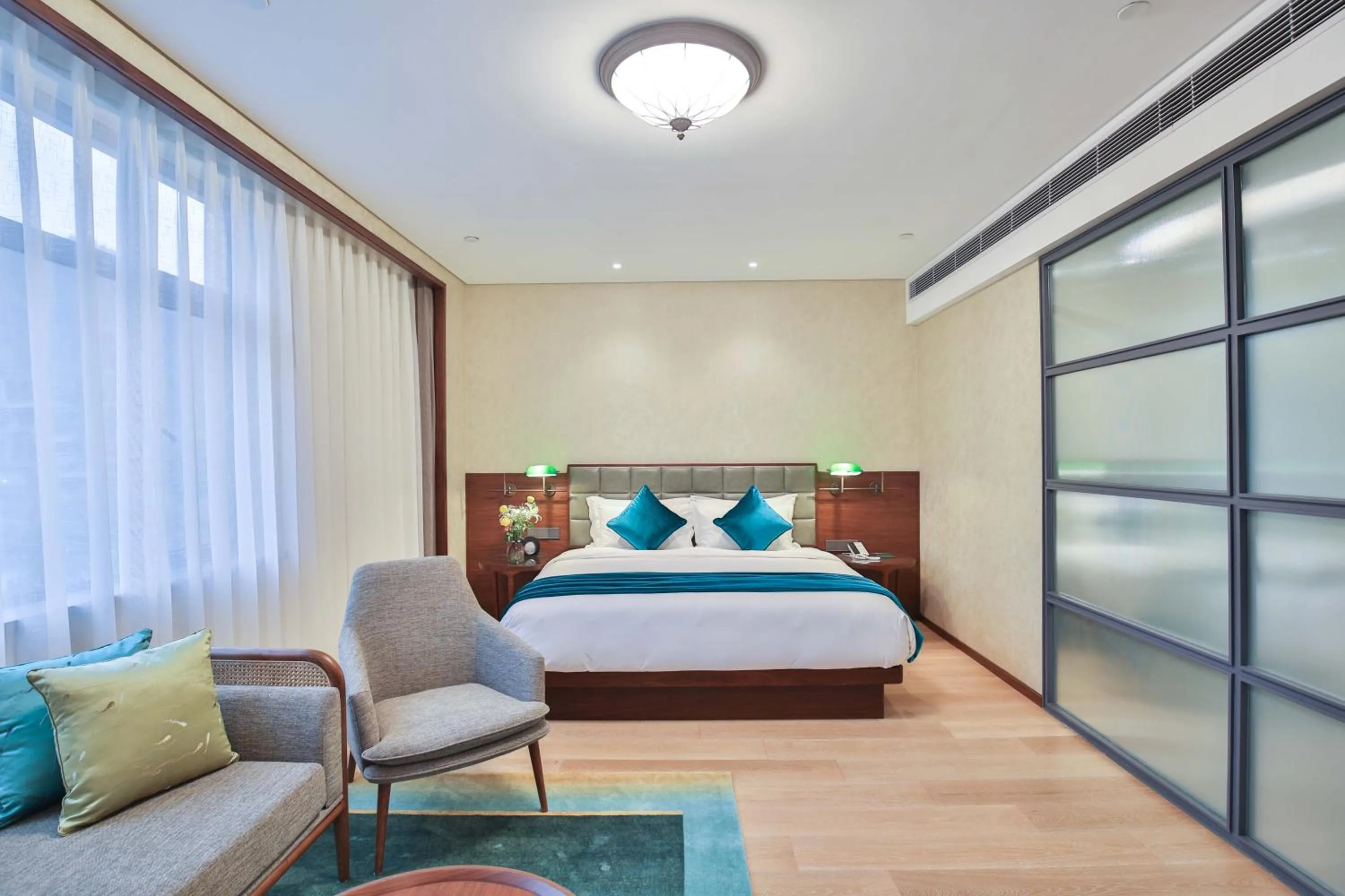 Bed in SSAW Garden Hotel Ningbo Xikou
