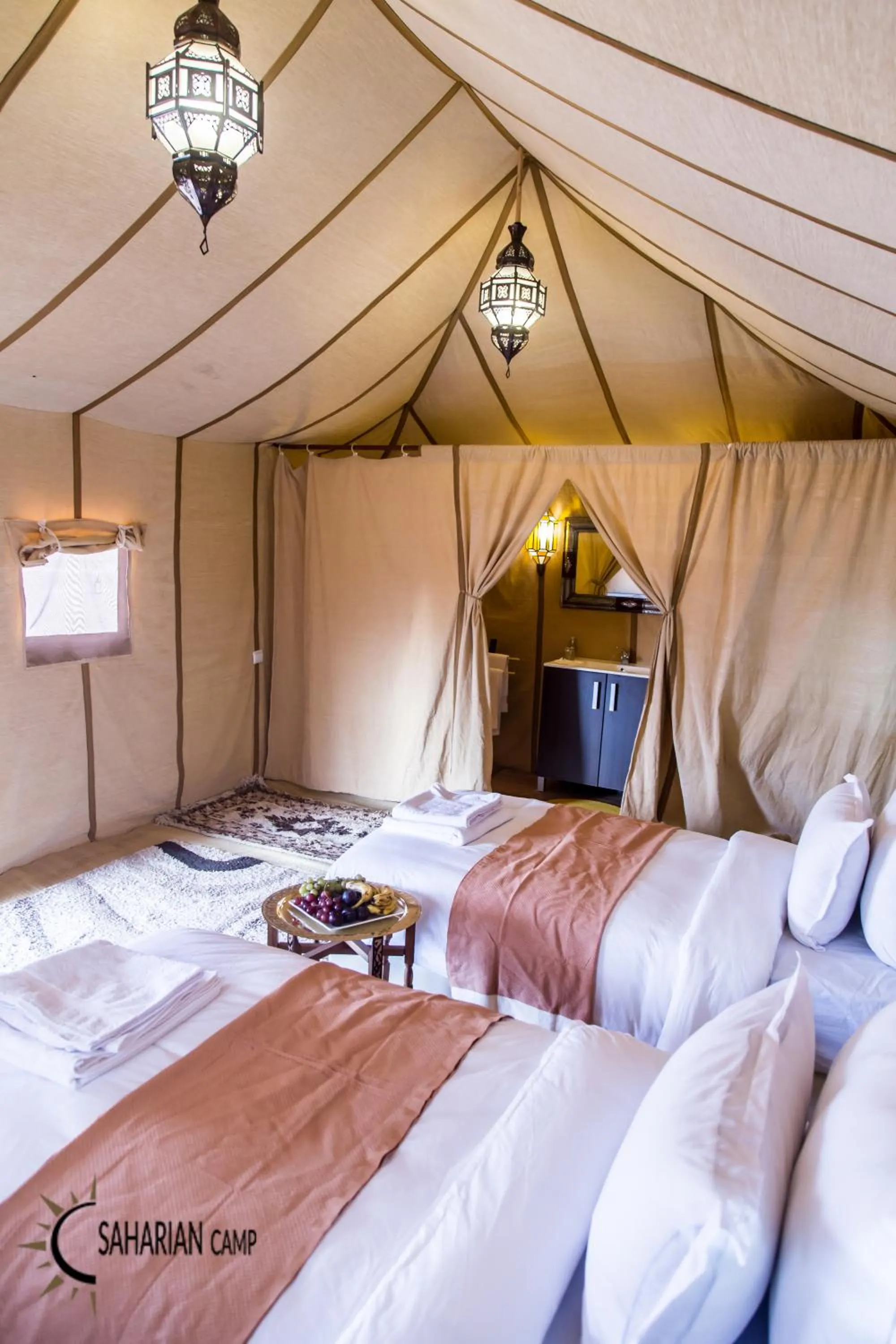 Bed in Merzouga Luxury Camp