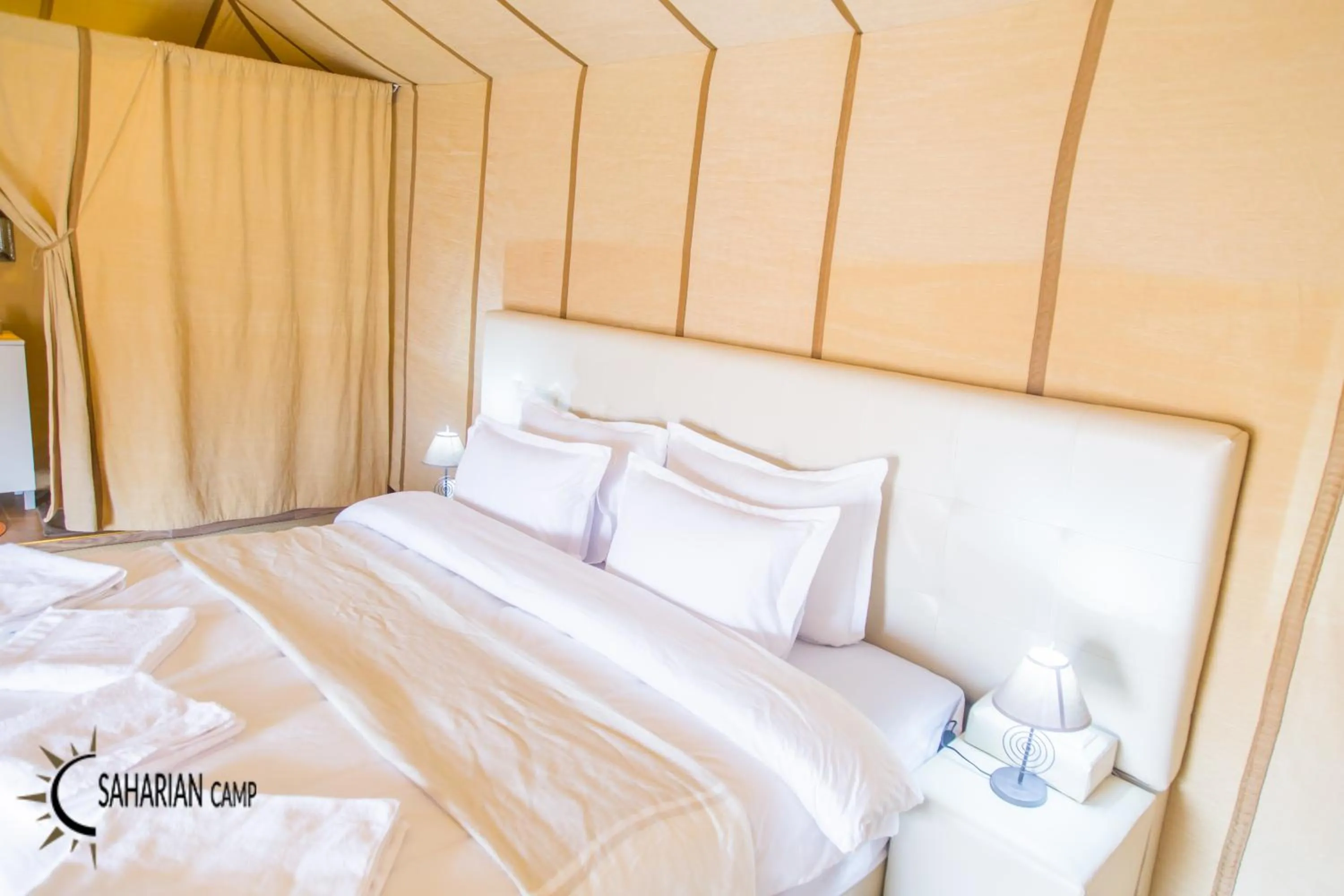 Bed in Merzouga Luxury Camp