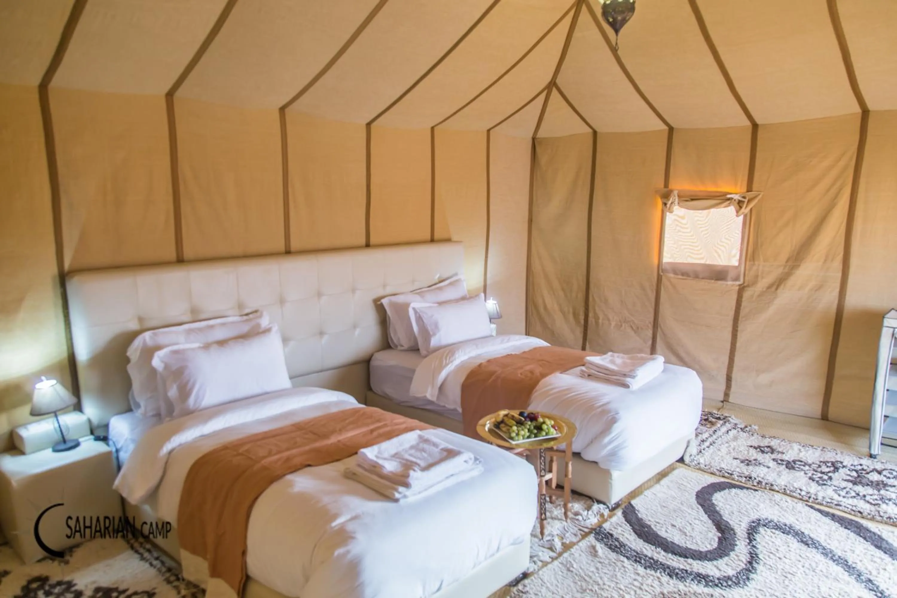 Bed in Merzouga Luxury Camp